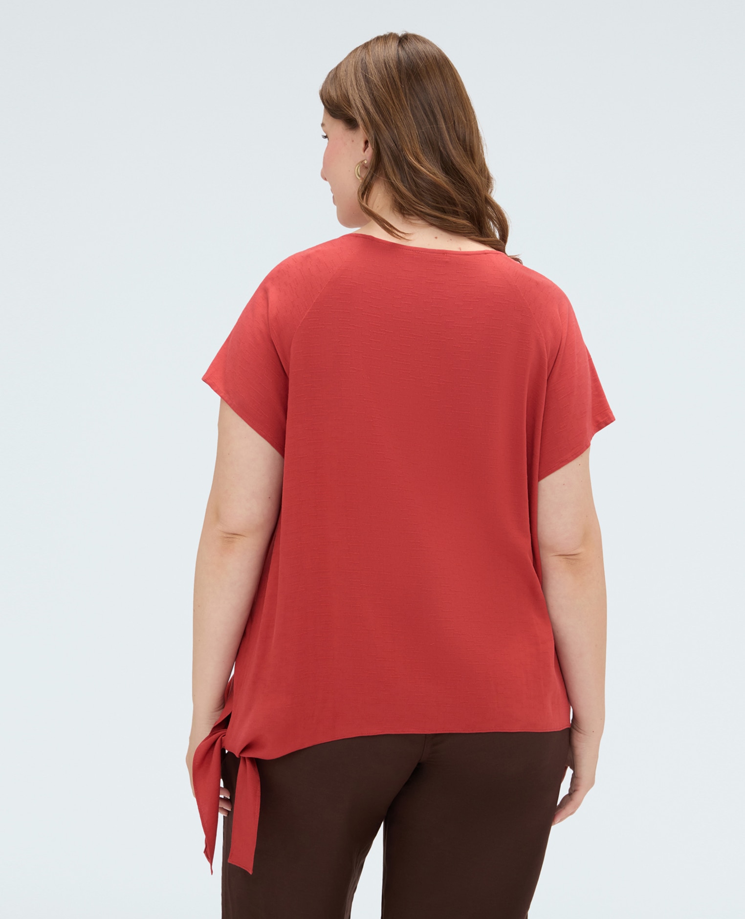 Top de mujer con aplicaciones de lentejuelas y nudo decoraciones de palmeras en lentejuelas y cuentas en la parte delantera con nudo lateral en la parte inferior - Fiorella Rubino - Naranja Naranja-2
