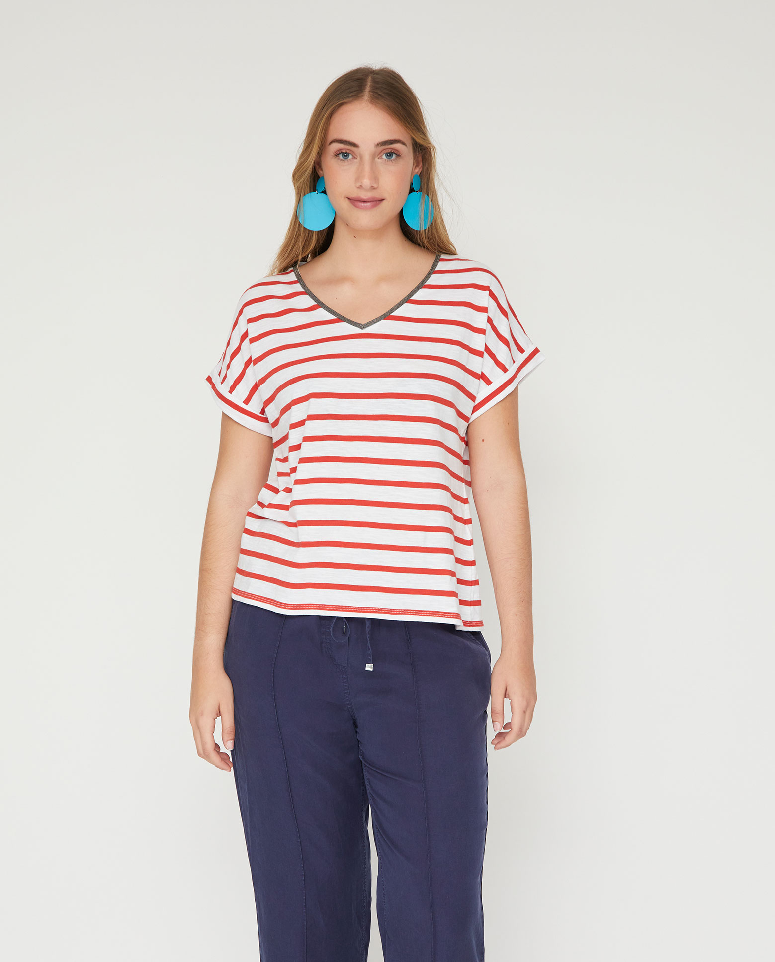 October - Camiseta de mujer rayas con fornitura metalizada.