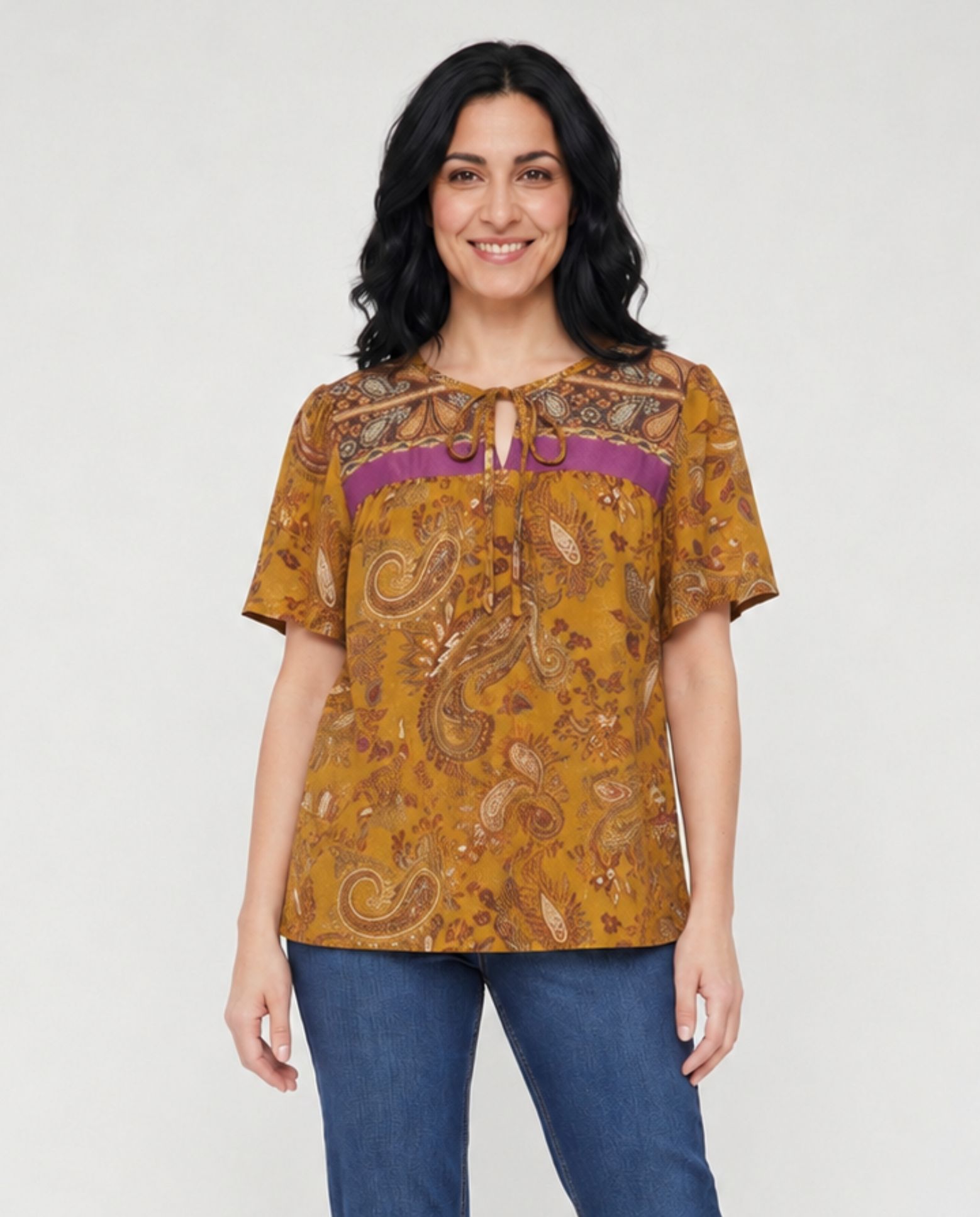 October - Blusa estampada con cuello anudado.