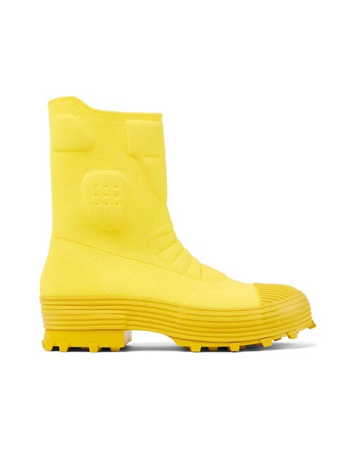 Imagen 0 de Botas unisex de color amarillo y suela dentada