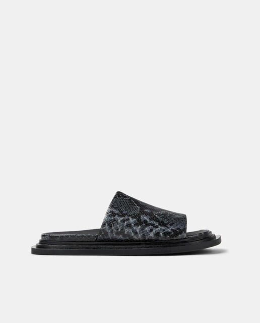 Imagen 0 de Sandalias planas unisex tipo pala con punta redonda