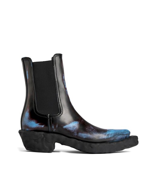 Imagen 0 de Botas de hombre en color negro de piel cepillada en tres tonos