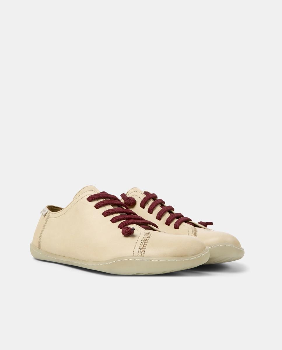 Zapatillas de piel de mujer lisas en beige