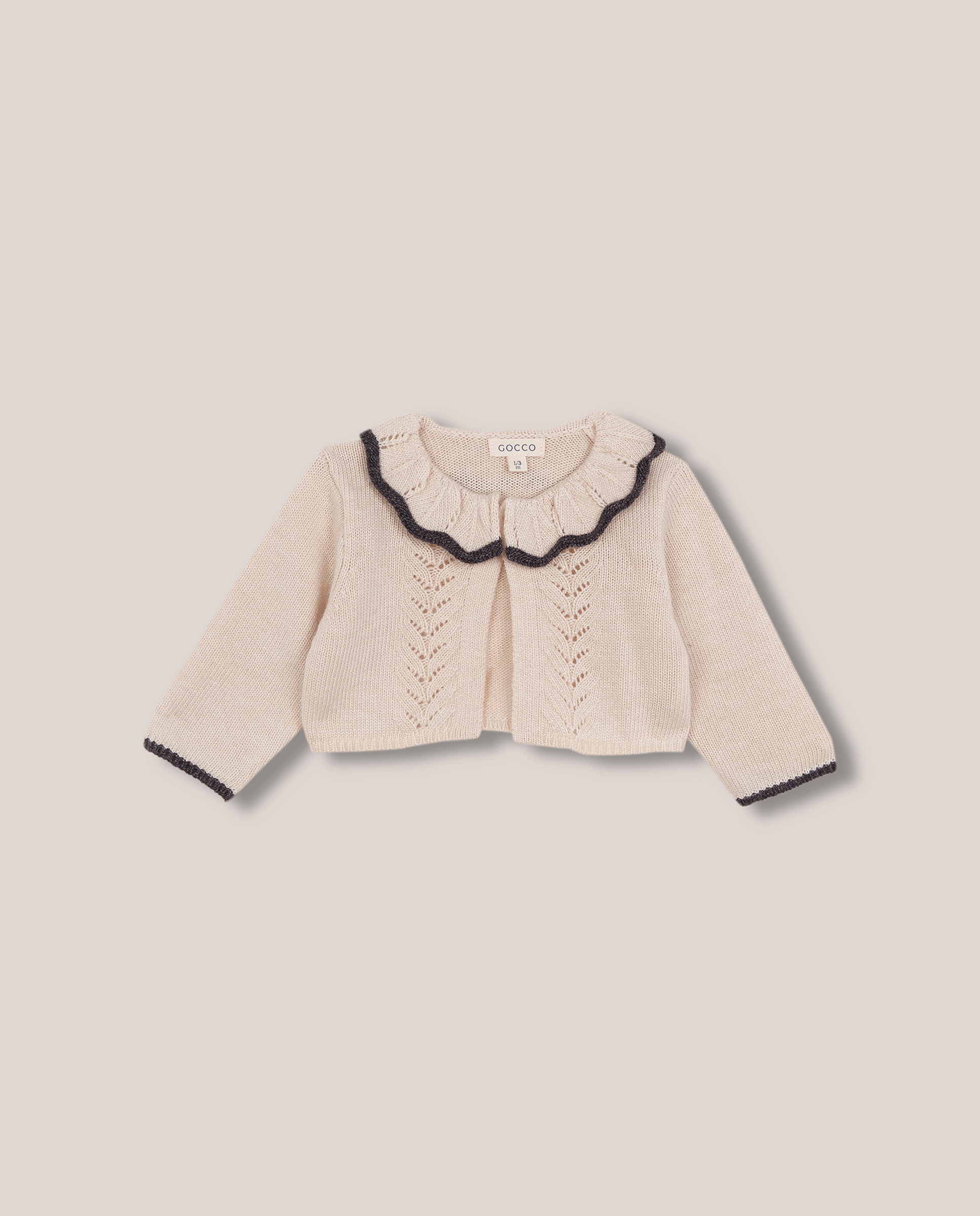 Imagen 0 de Chaqueta de bebé de punto con contraste Piedra