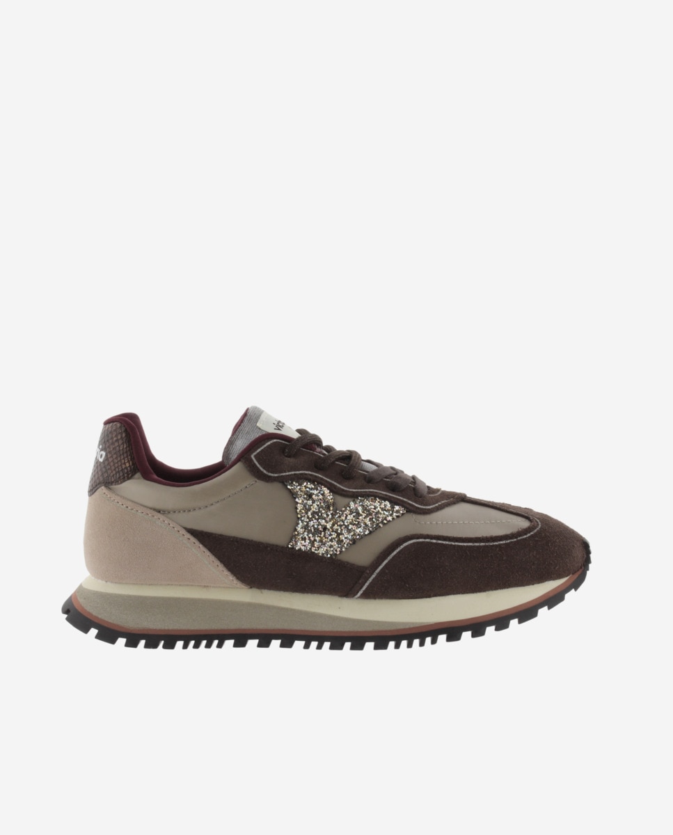 Imagen 0 de Zapatillas deportivas de mujer de nylon con piezas fantasía y de serraje y suela dentada Oro