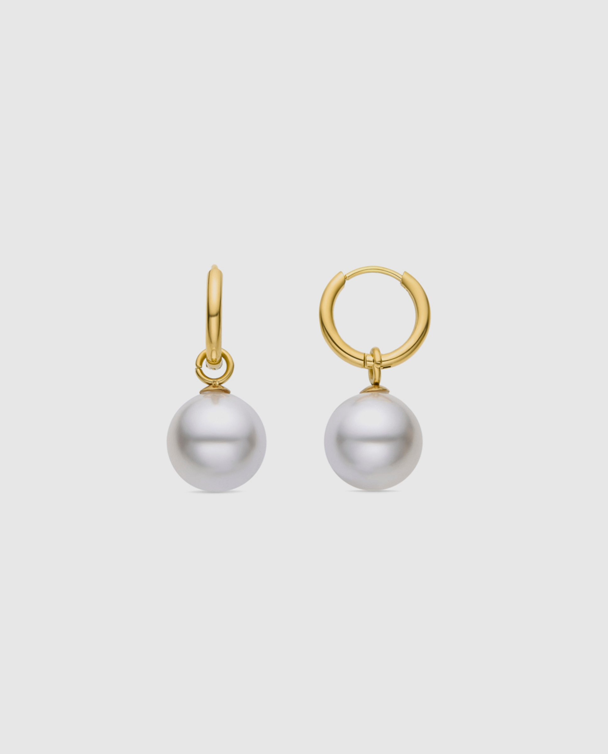 Pendientes Basic acabados en acero hipoalergénico con  perla blanca