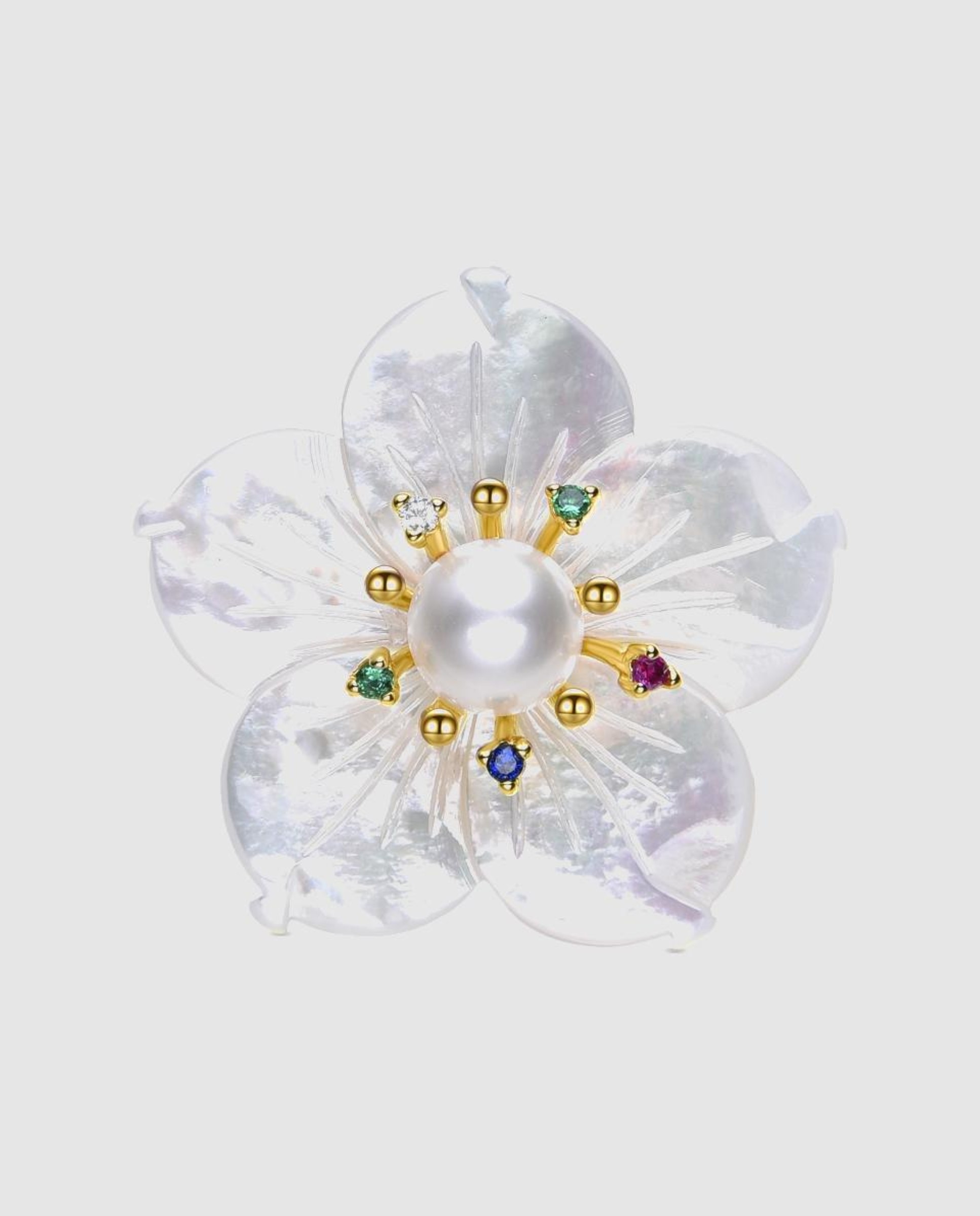Imagen 0 de Broche áfrica acabado en oro de 18 quilates con madreperla blanca Multicolor