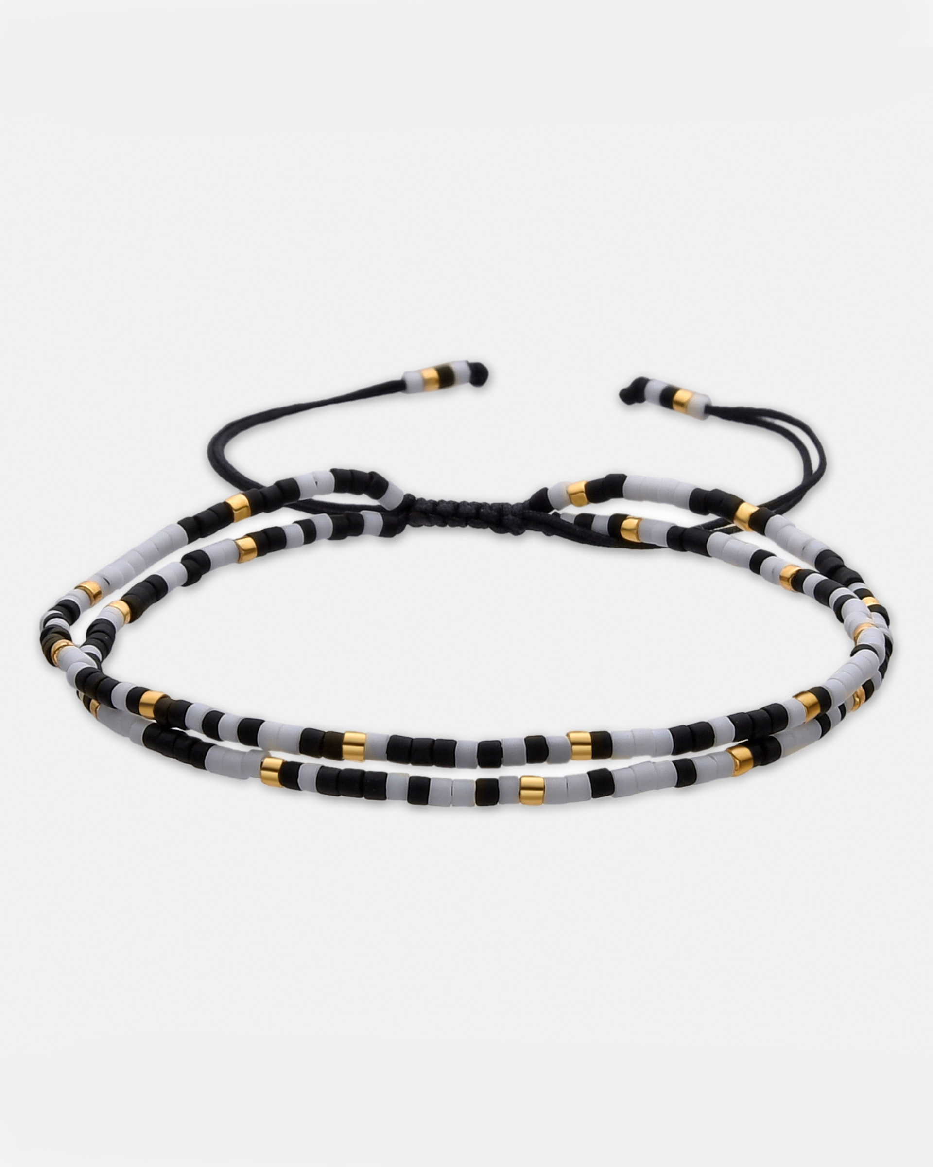 Pulsera de cadena trendy de acero acabada en amarillo de 18 quilates con cristal negro - Luxenter - Oro Oro-1