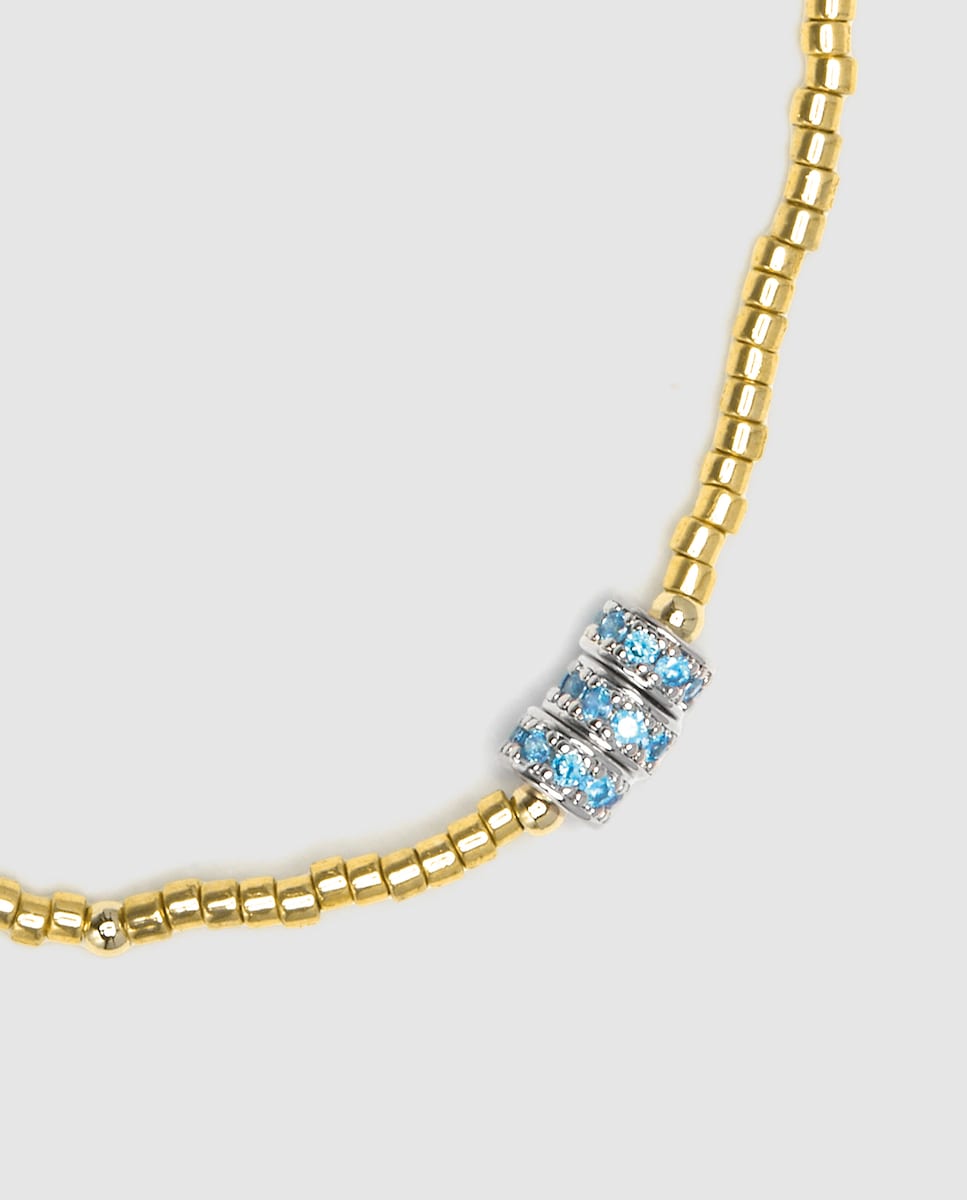 Pulsera Pide Un Deseo acabada en oro amarillo de 18k con circonita azul topacio Oro-5