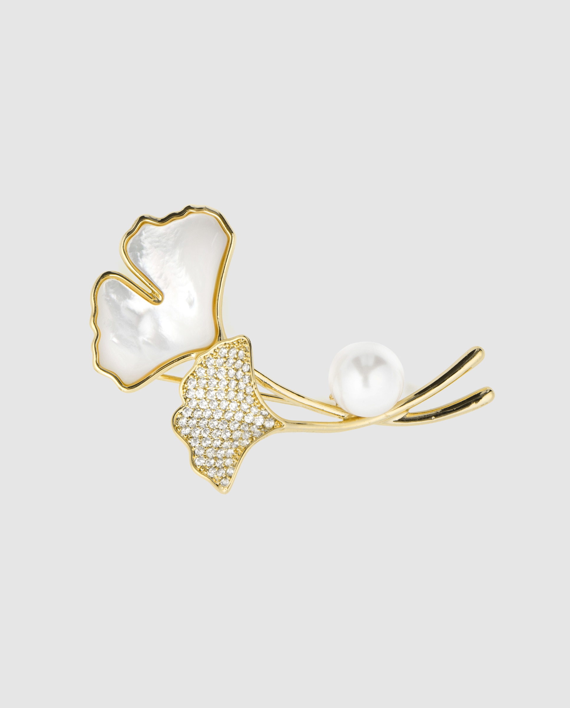 Imagen 0 de Broche áfrica acabado en oro amarillo de 18 quilates con madreperla blanca Blanco