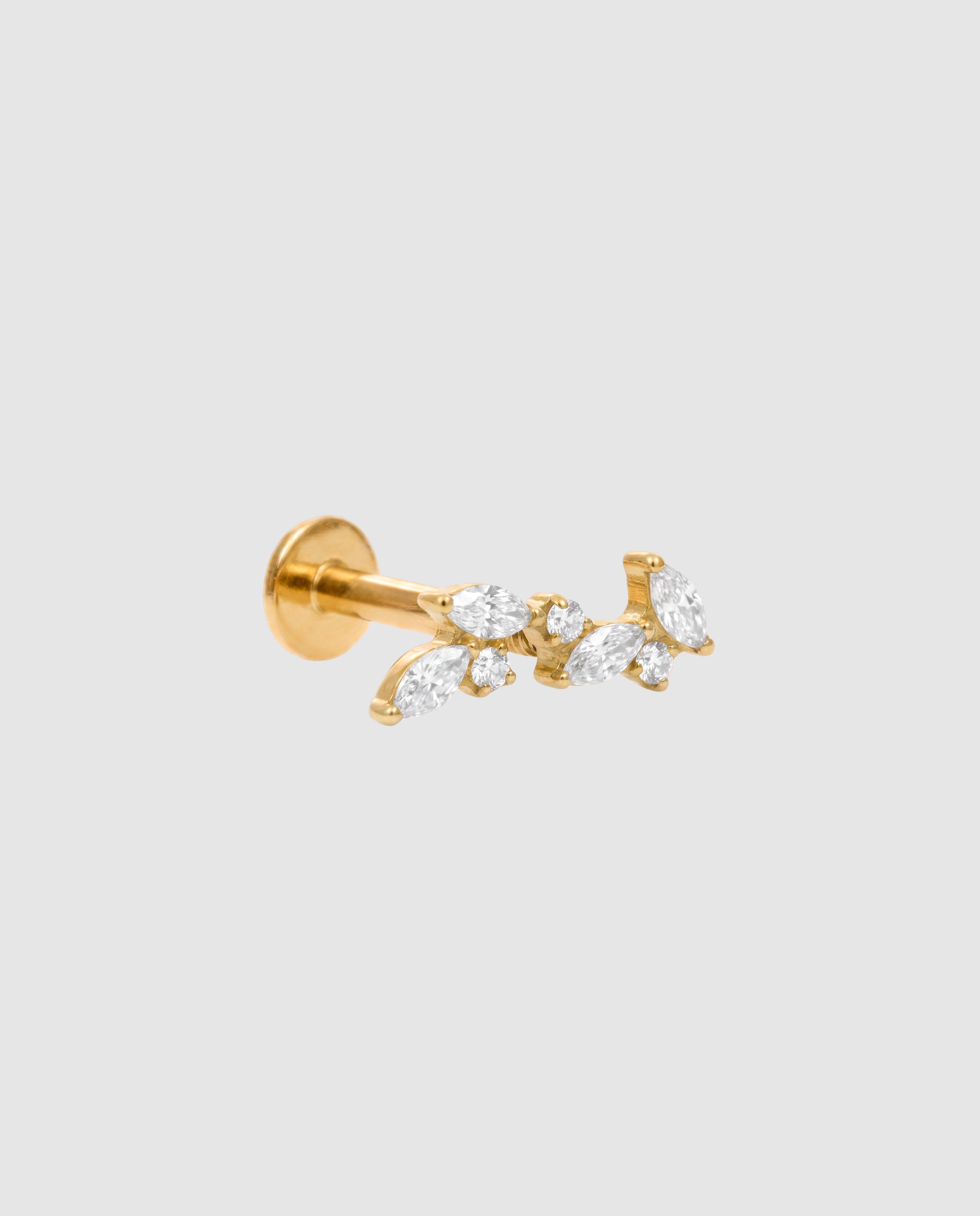 Imagen 0 de Piercing de titanio con circonita acabado en oro de 18k Blanco