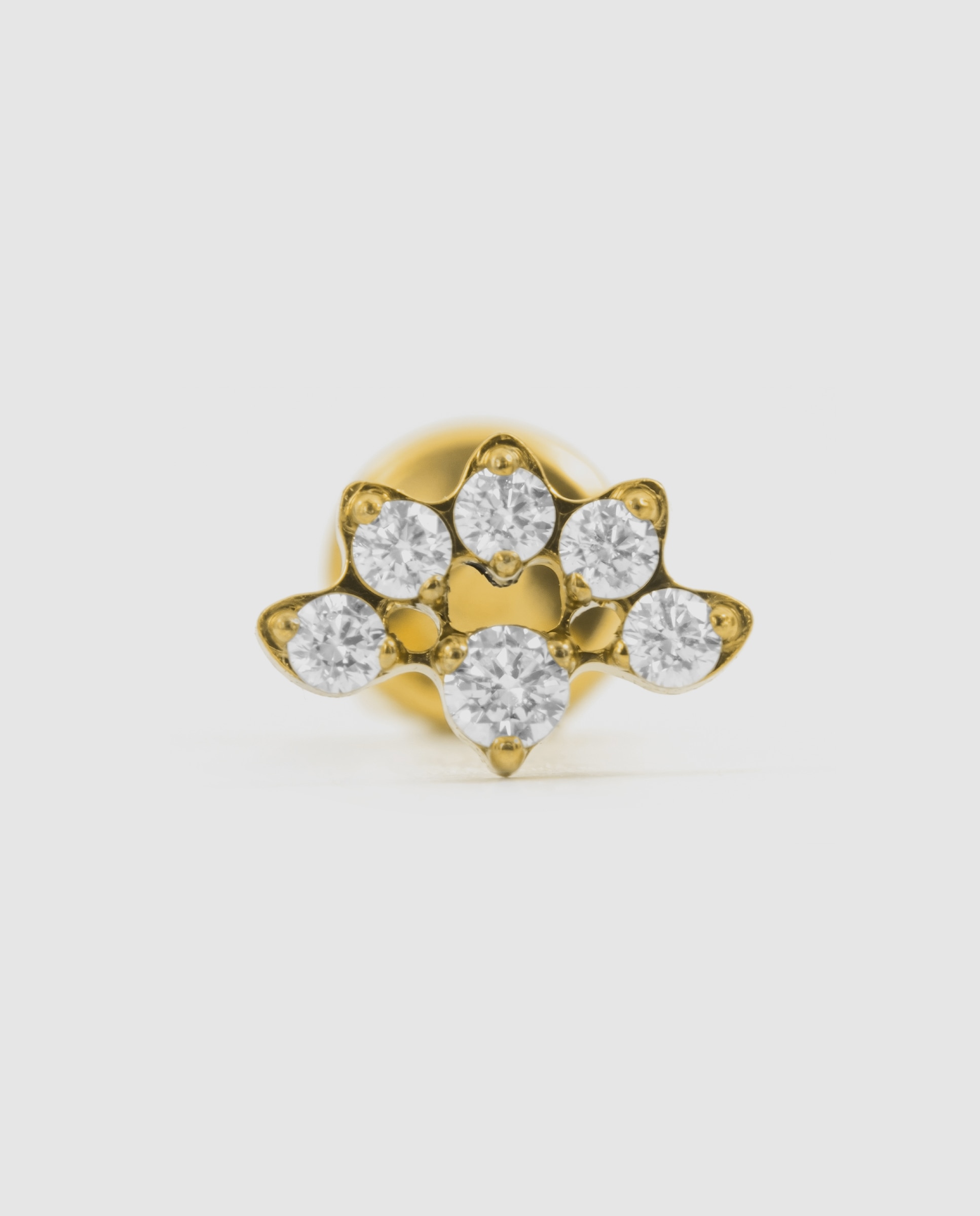 Imagen 0 de Piercing de titanio con circonita acabado en oro de 18k Blanco