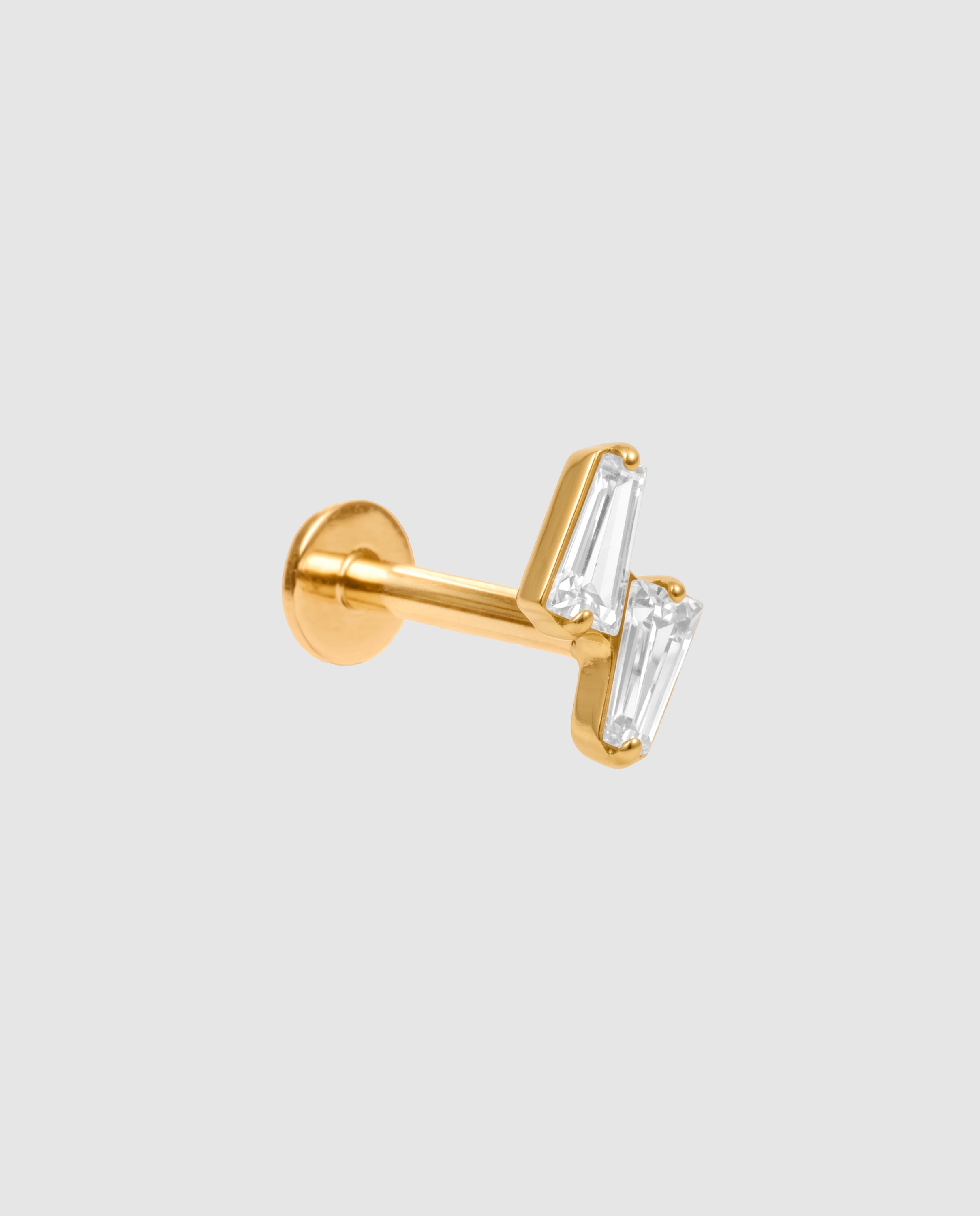 Imagen 0 de Piercing de titanio con circonita acabado en oro de 18k Blanco