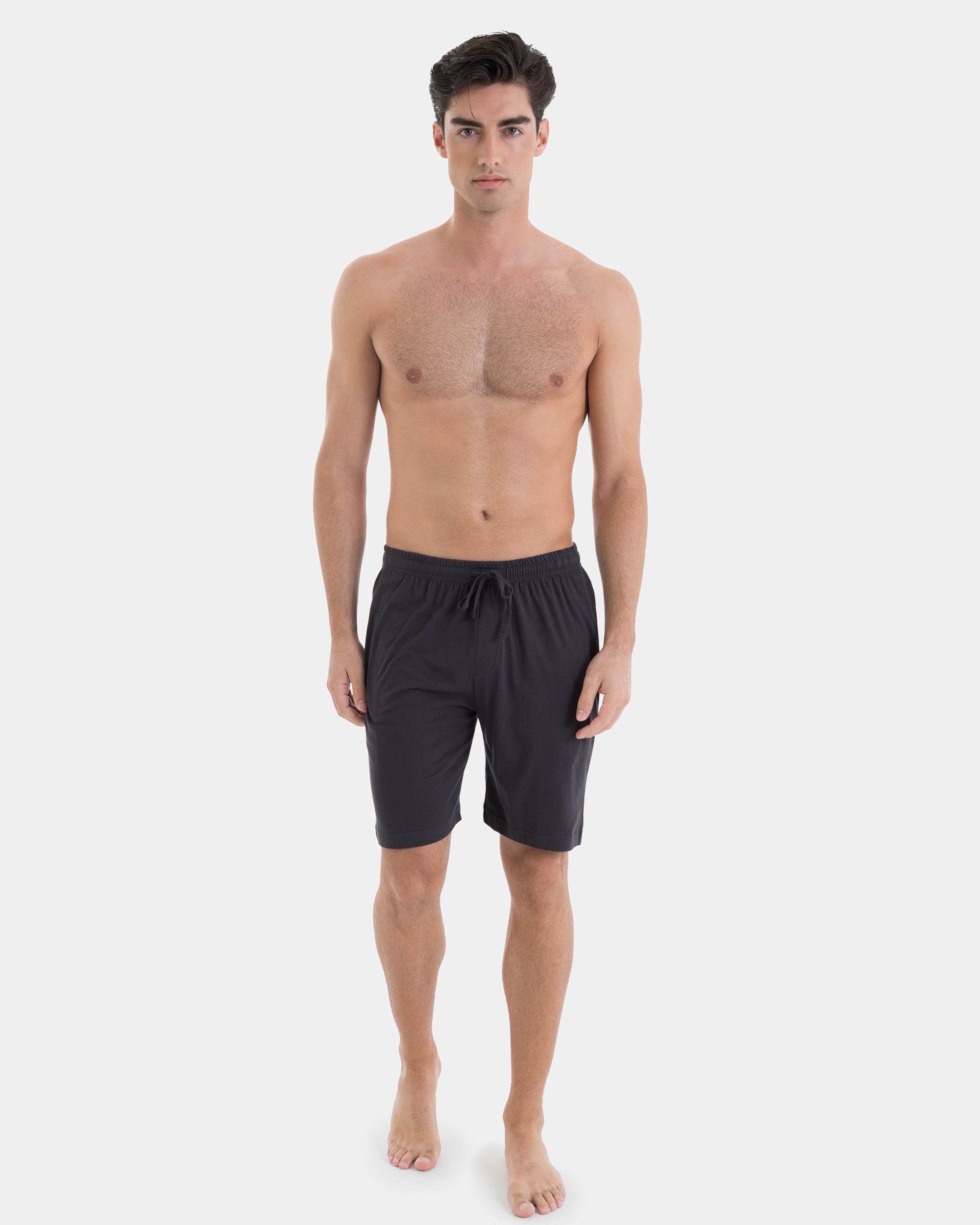 Imagen 0 de Pantalón corto de hombre con cintura elástica y bolsillos laterales Negro