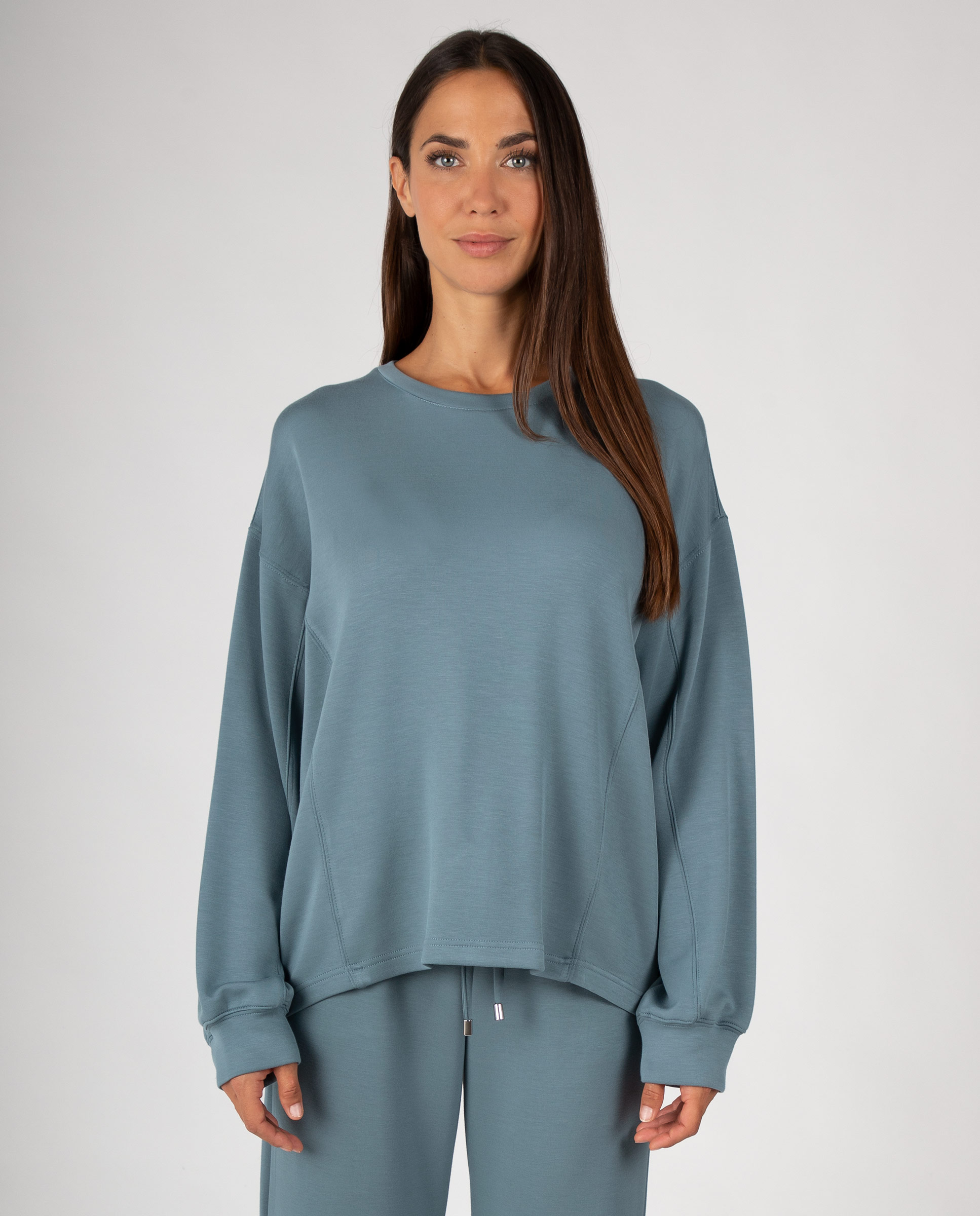 Imagen 0 de Sudadera de mujer lisa con costuras decorativas y puños mangas Petróleo