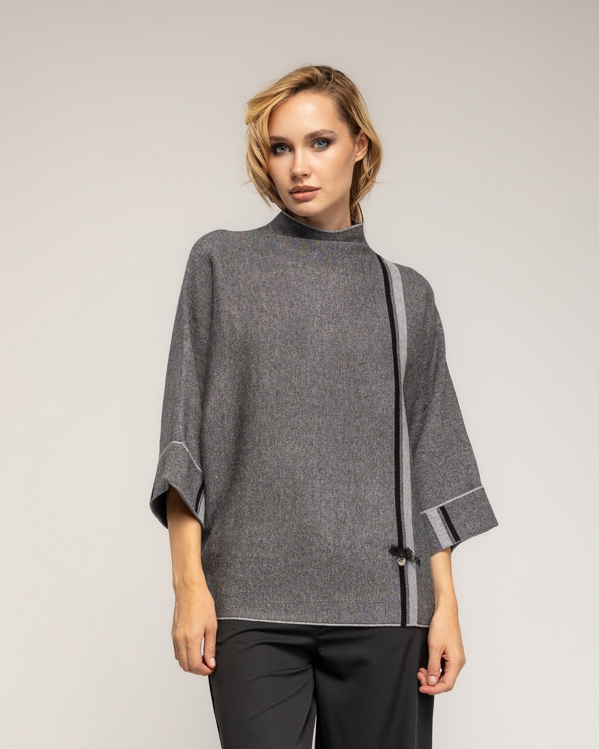 Imagen 0 de Jersey de mujer de punto jaspeado  y raya lateral Gris