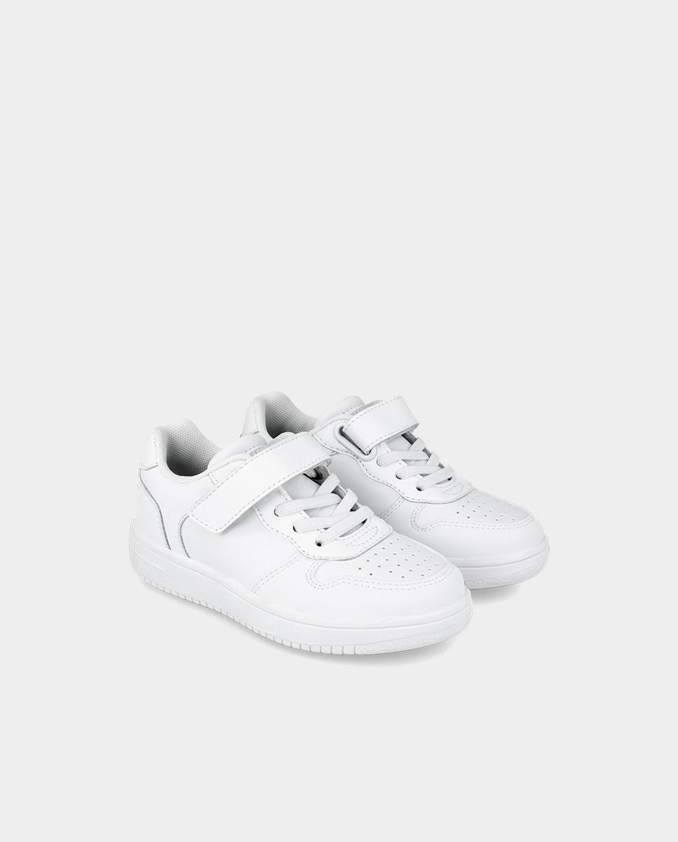 Zapatillas deportivas de niño de piel con cierre de cordones y