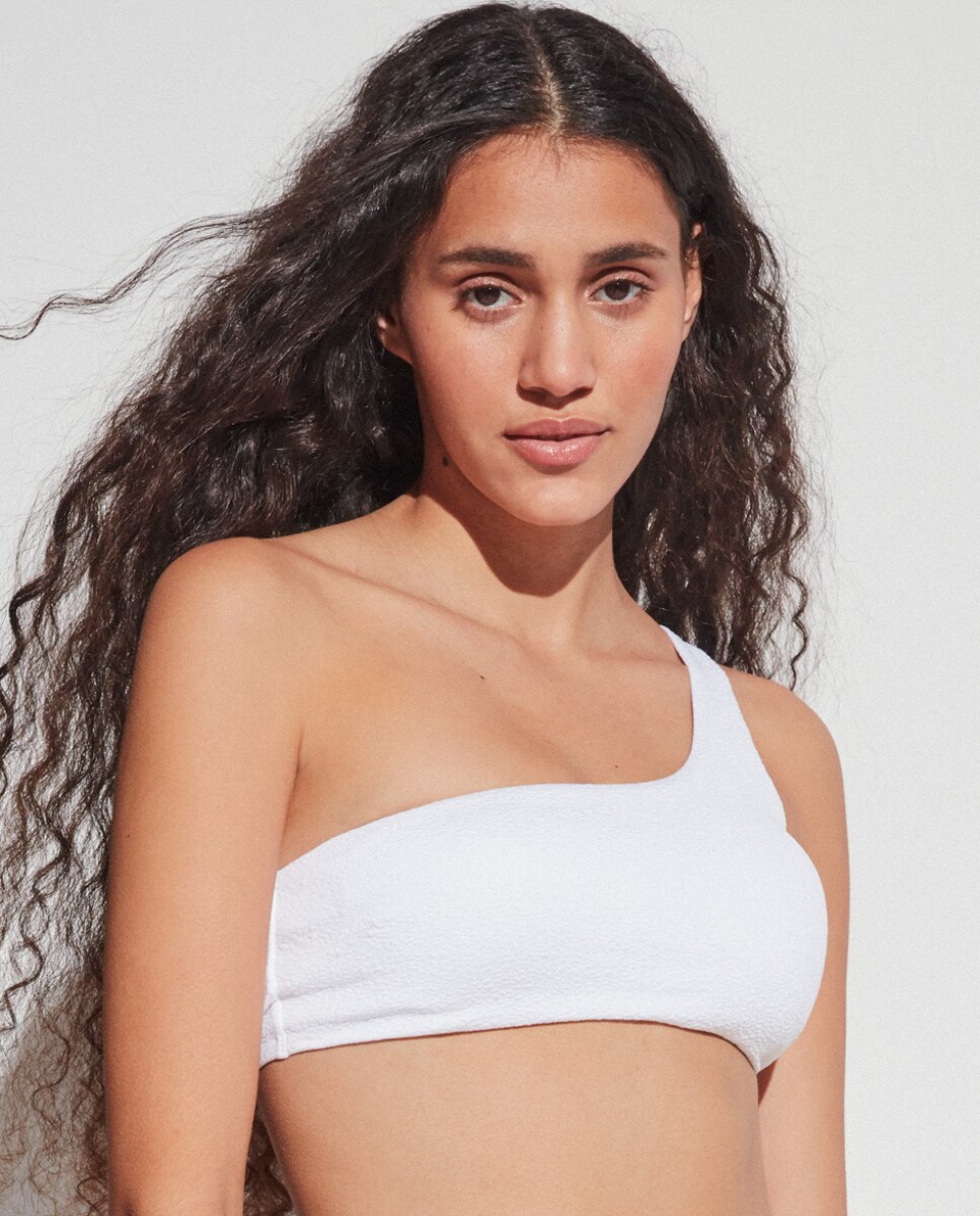 Top de bikini sin aro y foam extraíble en tejido calado · Gisela · El Corte Inglés