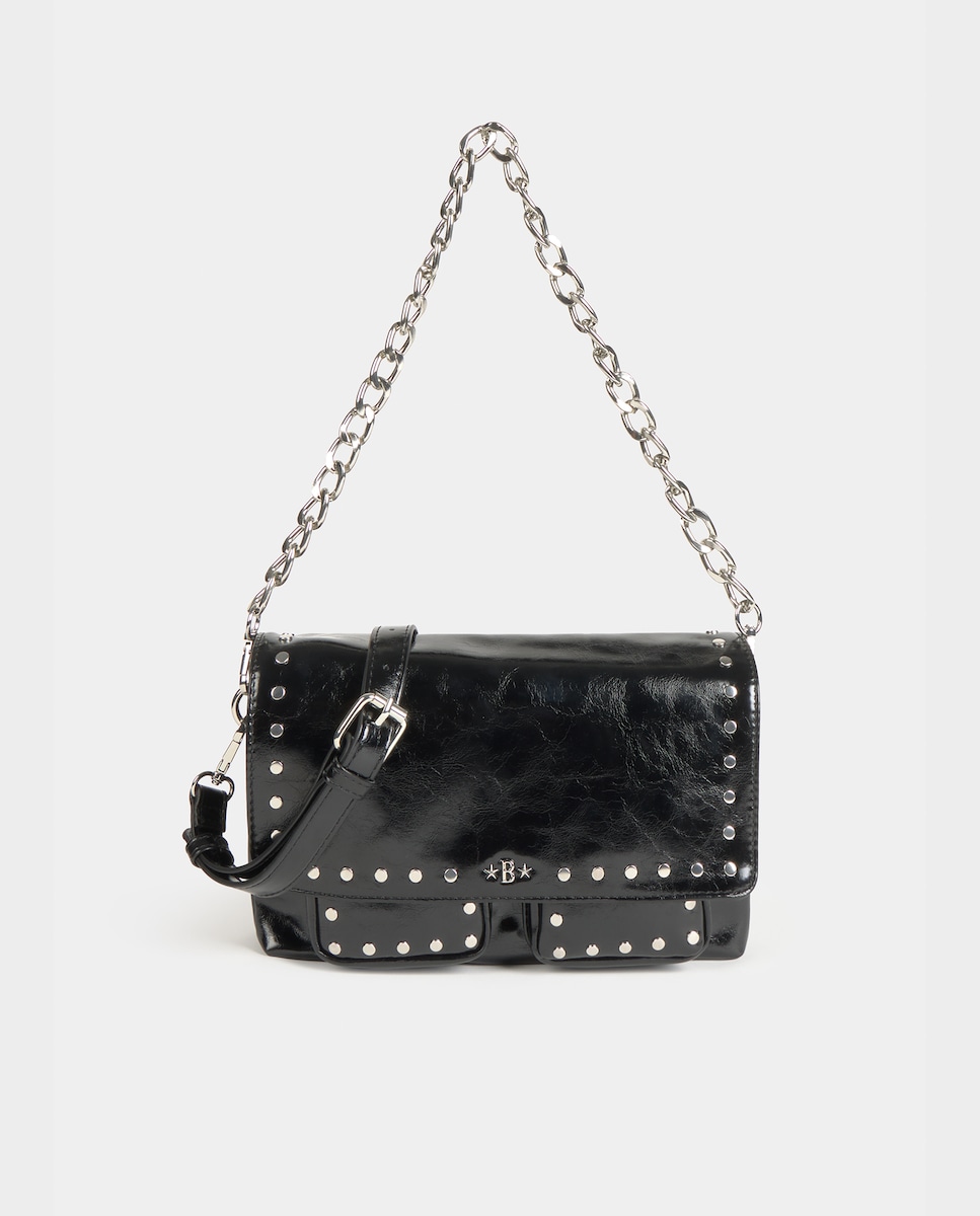 Bolso de hombro con solapa y bolsillos color negro · Brownie · El