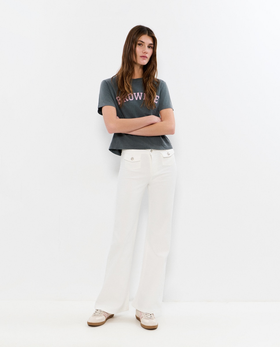 Brownie - Pantalón campana de mujer con bolsillos frontales.