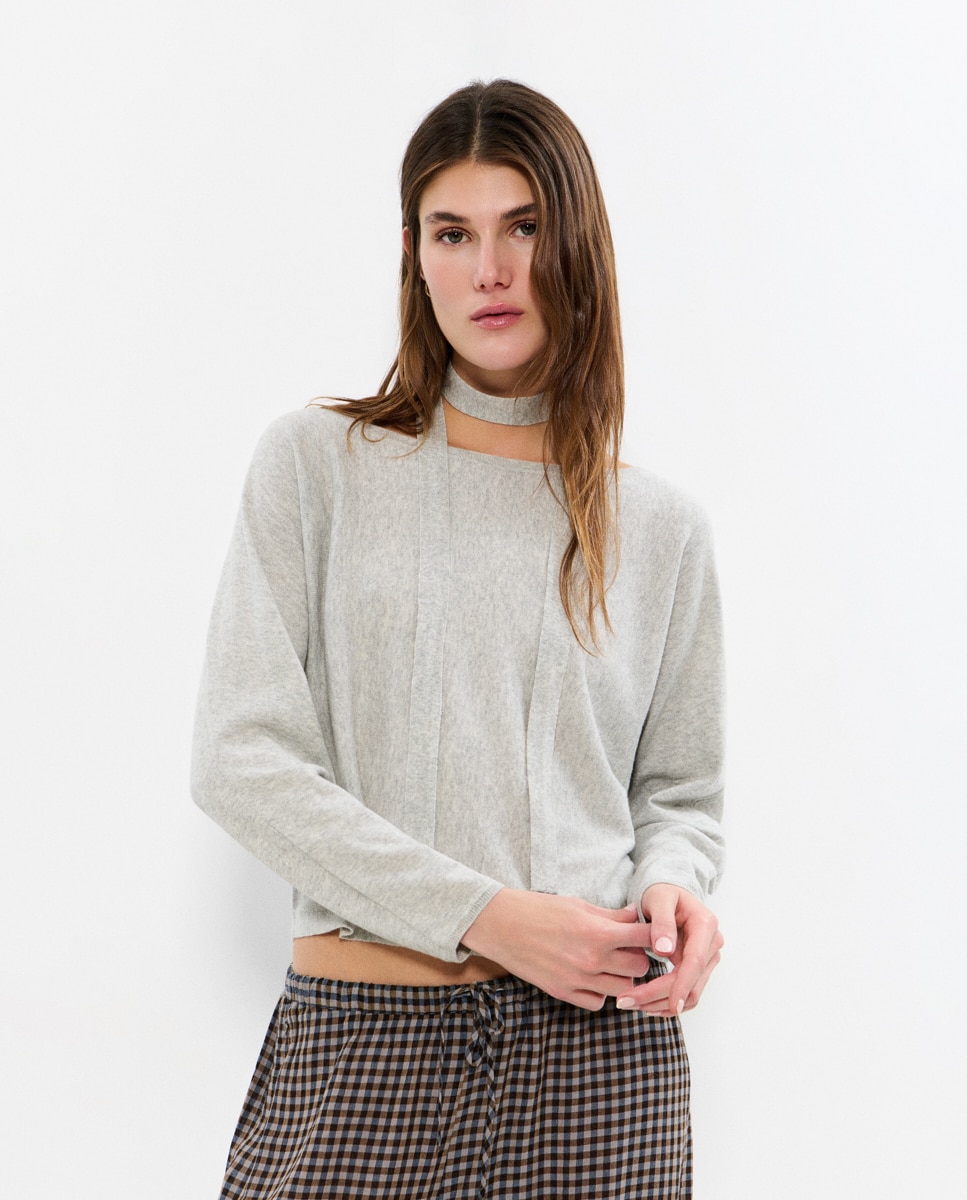 Brownie - Jersey de mujer con hombro caído y choker.