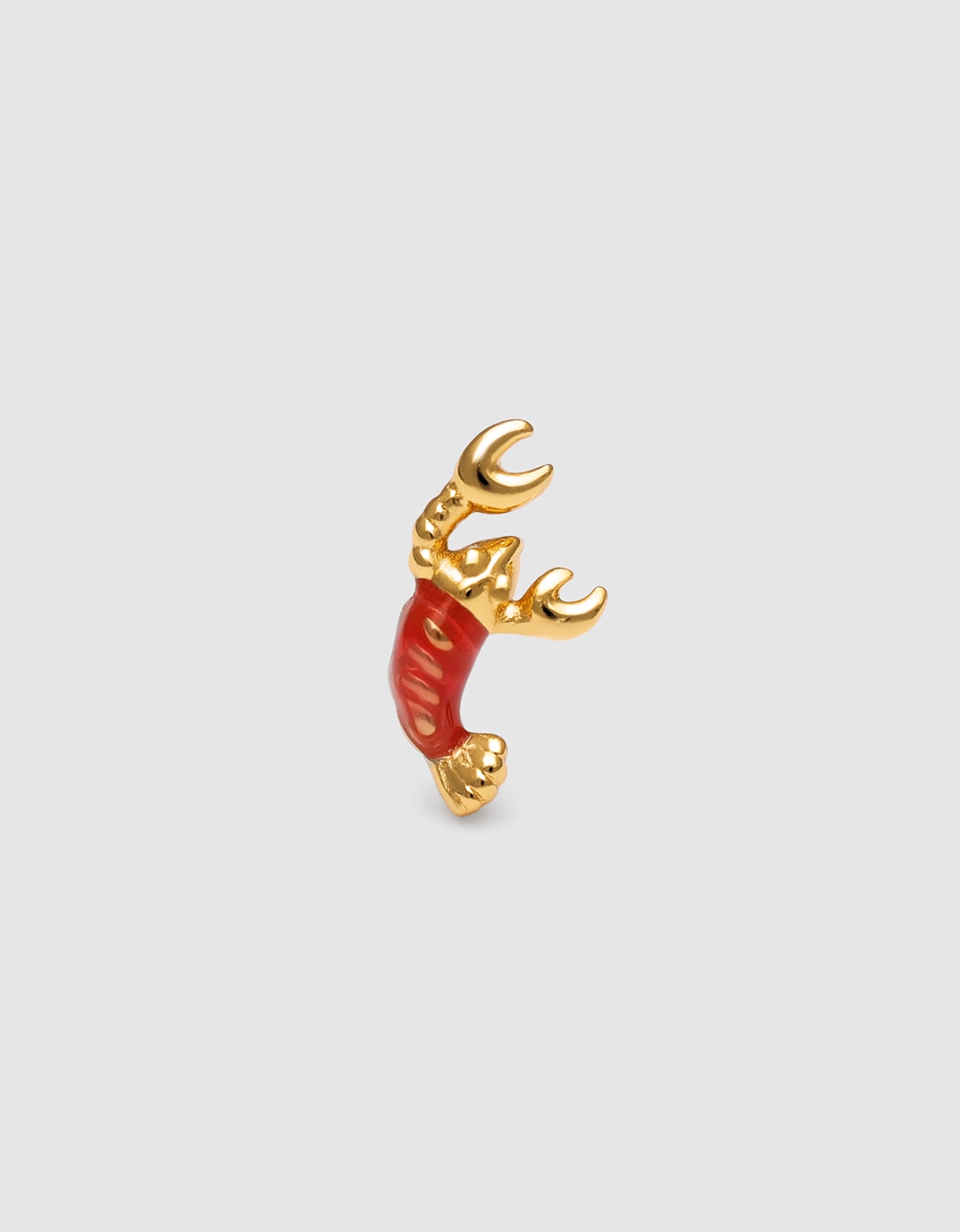 Imagen 0 de Piercing gambita de plata bañada en oro Rojo