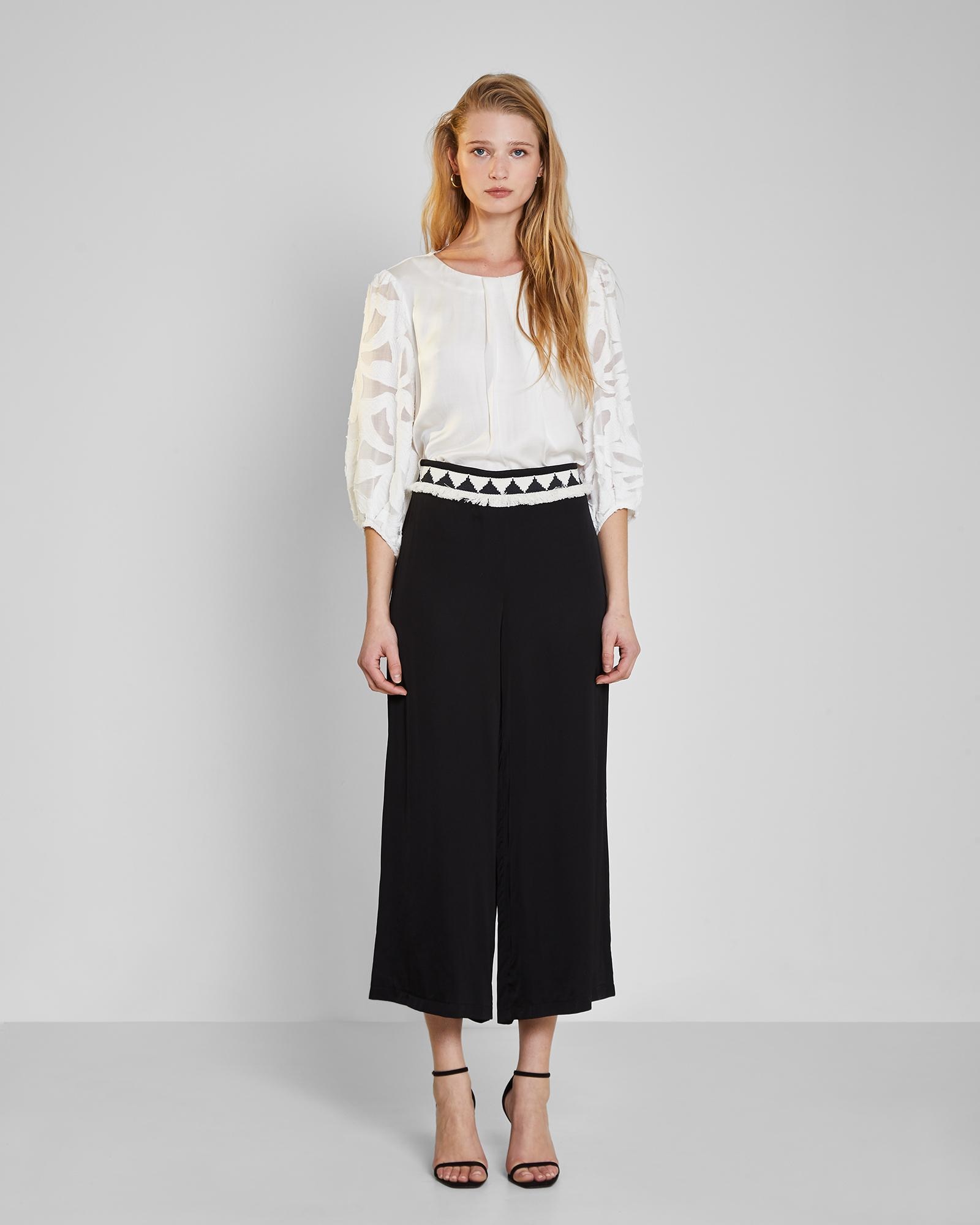 Trucco - Pantalones palazzo de mujer con cinturón de flecos.
