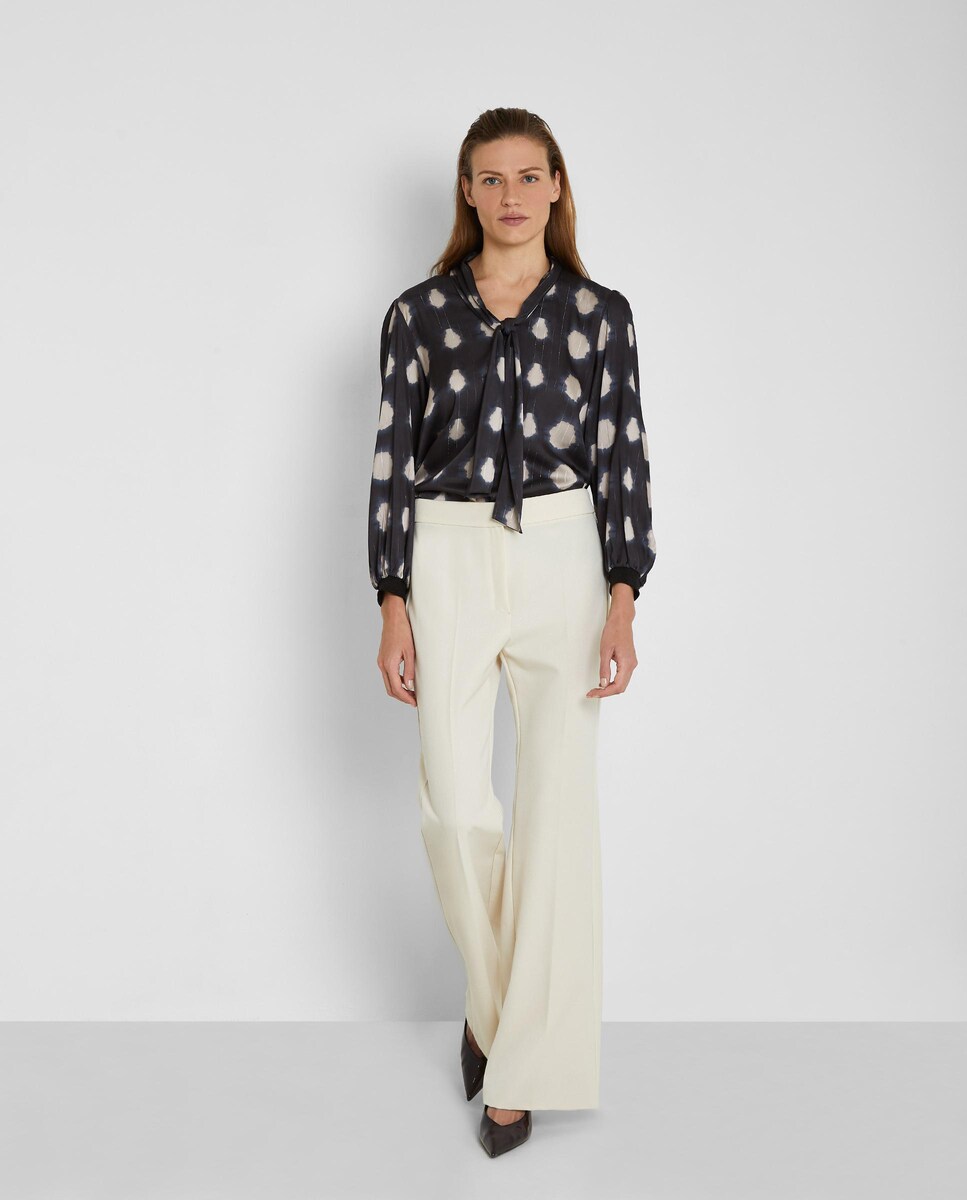 Blusa de mujer estampada con lazo en el cuello · Trucco · El Corte