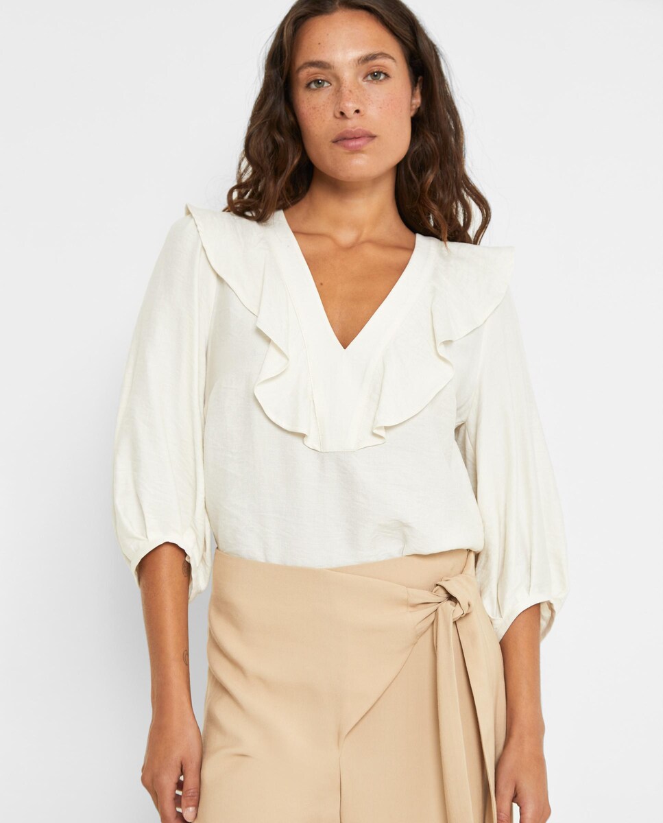 Blusa de mujer con cuello pico y volantes · Trucco · El Corte Inglés