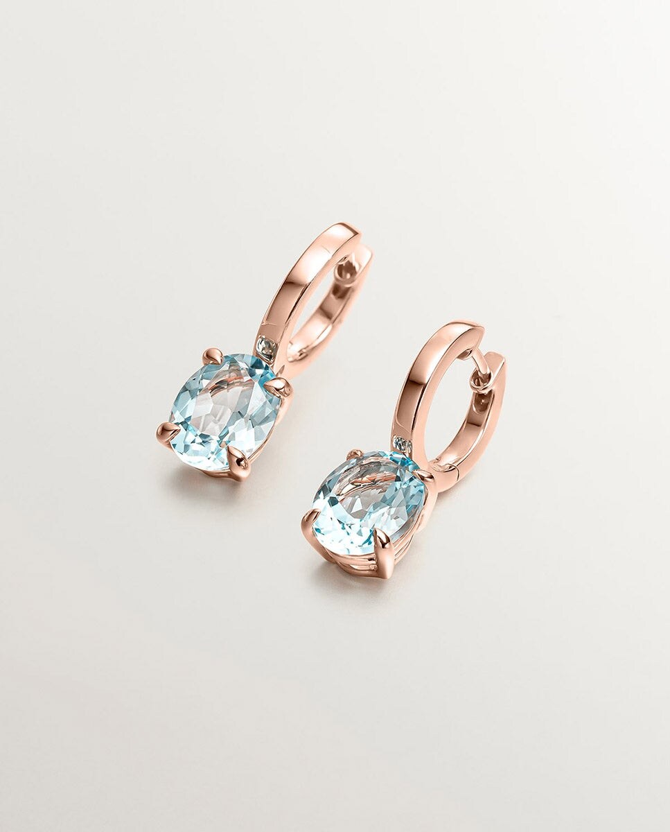 Pendientes de plata bañada en oro rosa de 18K con topacio azul sky Azul-1