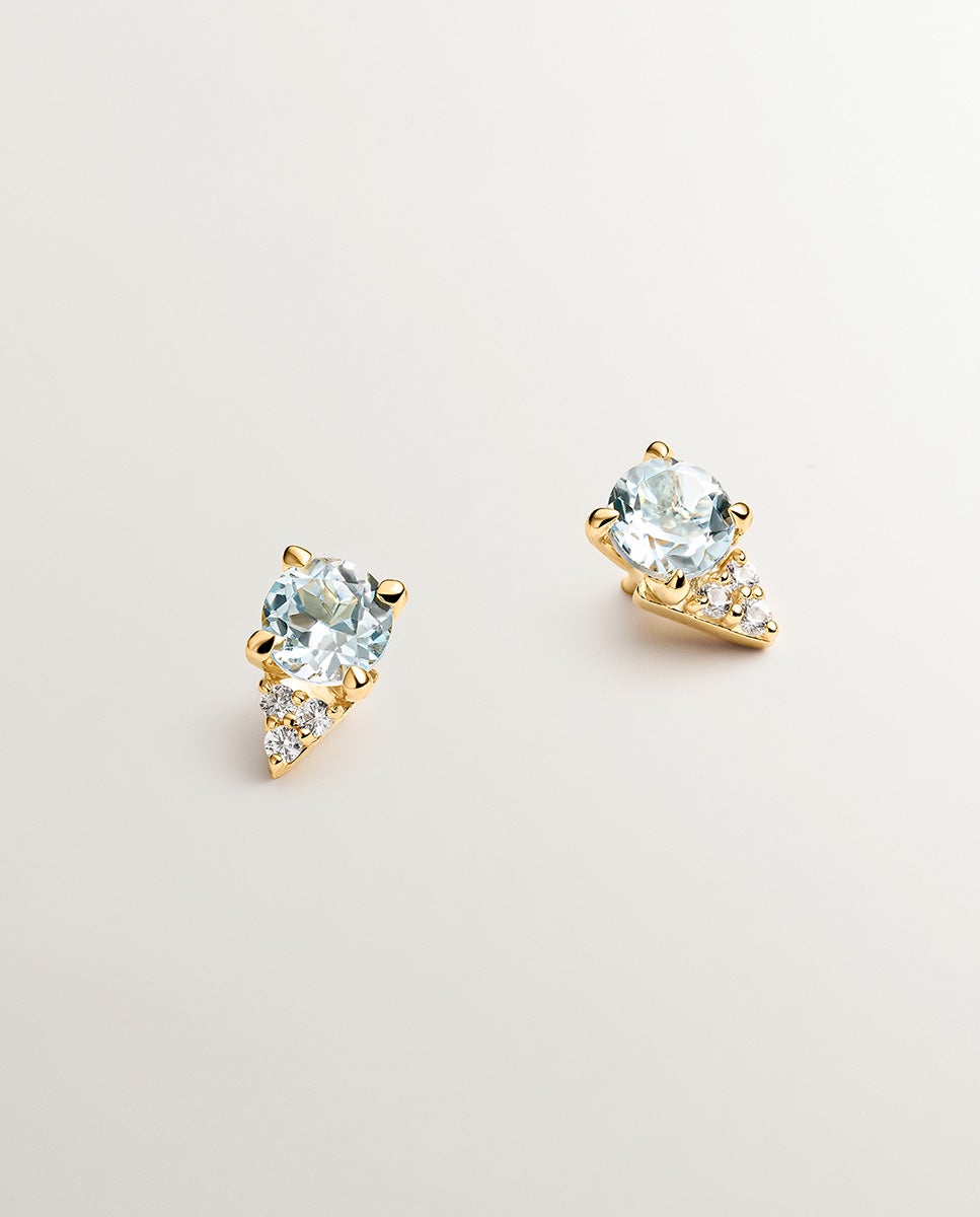 Pendientes de plata 925 bañada en oro amarillo de 18k con topacios azul sky y zafiros blancos