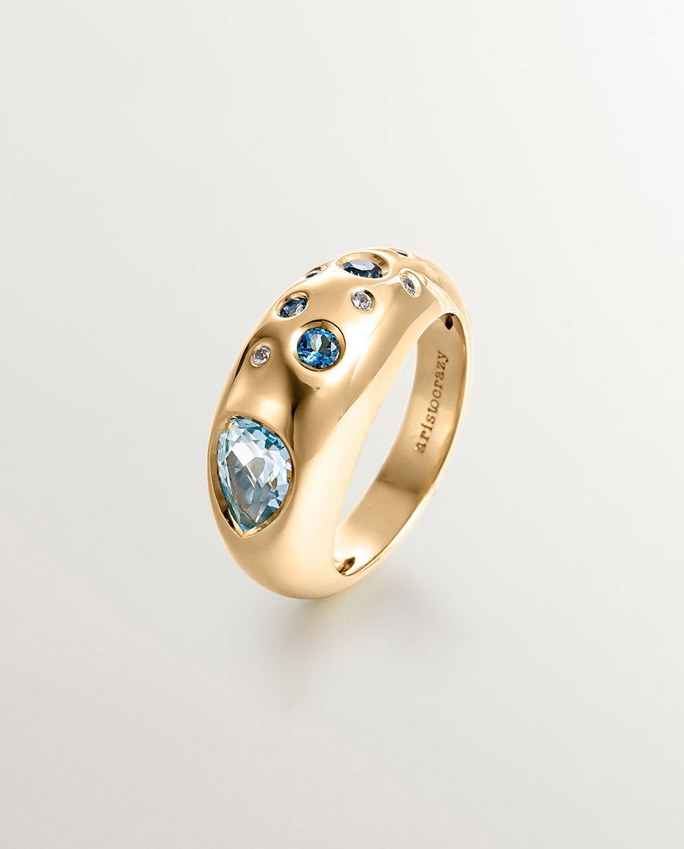 Anillo de plata 925 bañada en oro amarillo de 18k con topacios azul sky y azul london
