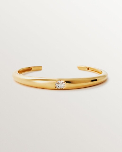 Imagen 0 de Pulsera rígida de plata 925 bañada en oro amarillo de 18K con topacio blanco