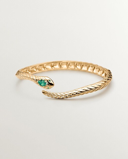 Imagen 0 de Pulsera rígida de plata 925 bañada en oro amarillo de 18K con ónix verde y con forma de serpiente