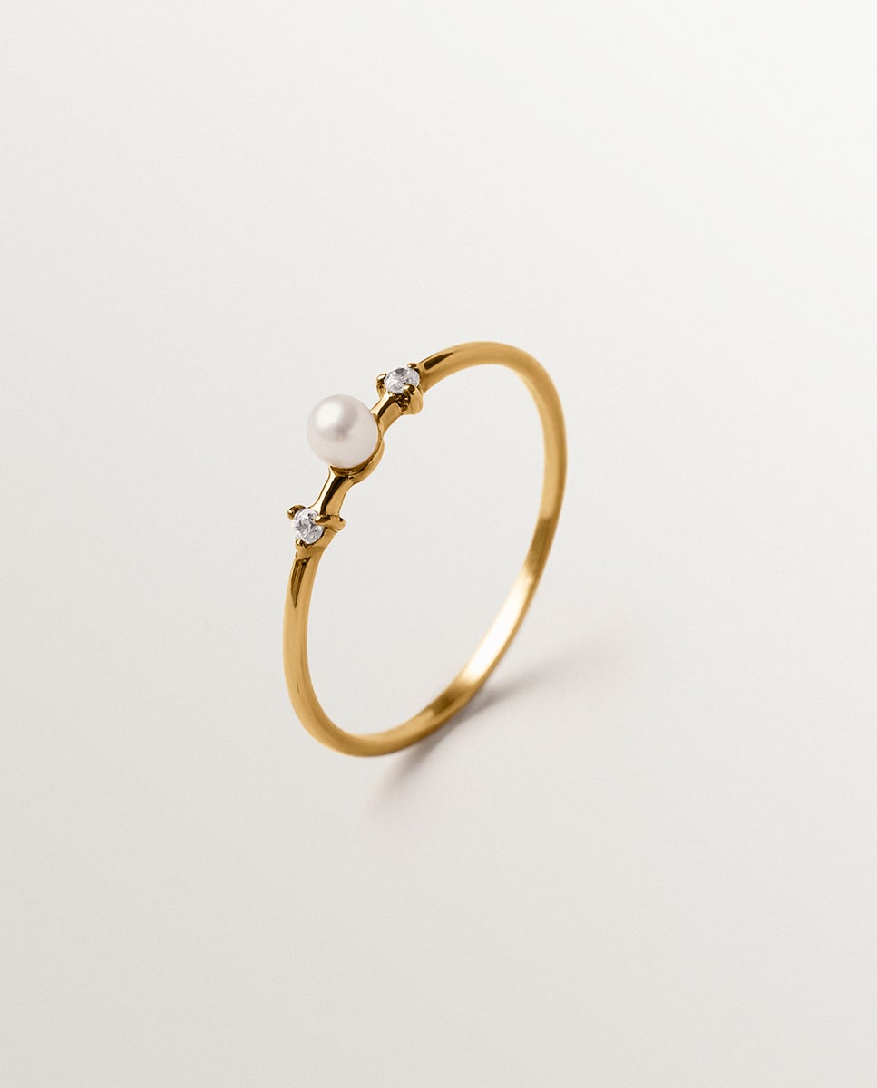 Anillo de plata 925 bañada en oro amarillo de 18k con perla y topacios blancos