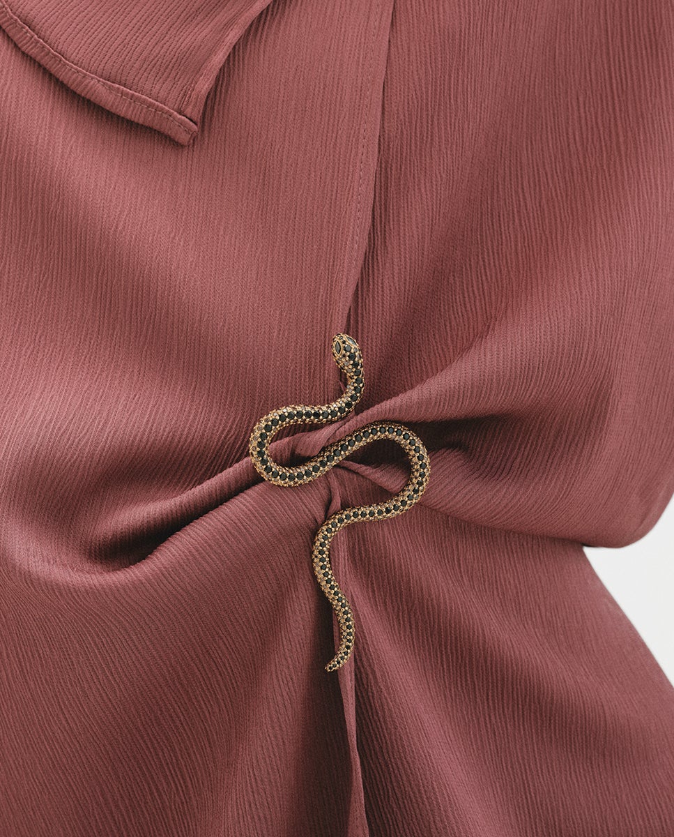 Imagen 0 de Broche bañado en oro amarillo con cristales y forma de serpiente Blanco