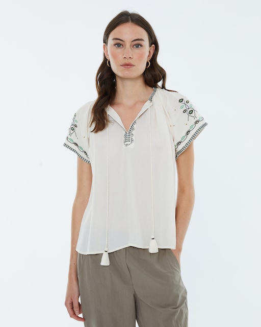Imagen 0 de Blusa de mujer de manga corta y bordados florales