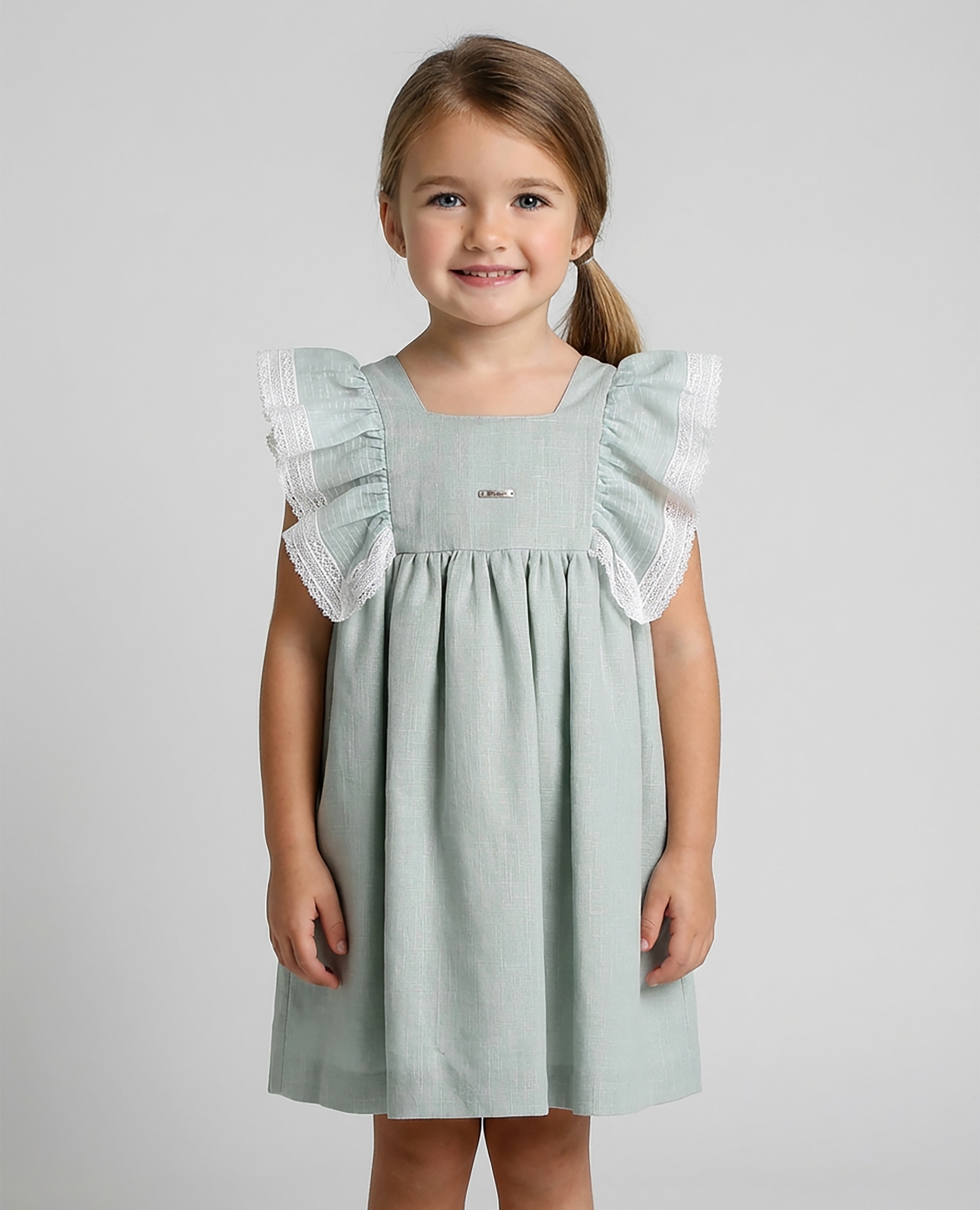 Imagen 0 de Vestido de lino de niña con volante de gasa Verde Agua