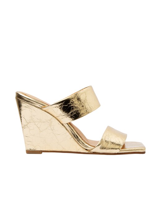 Sandalias de cuña de mujer de piel en color oro