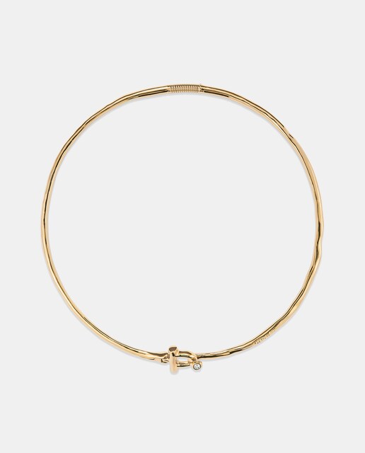 Imagen 0 de Collar rígido con cierre frontal bañado en oro 18k con topacio blanco