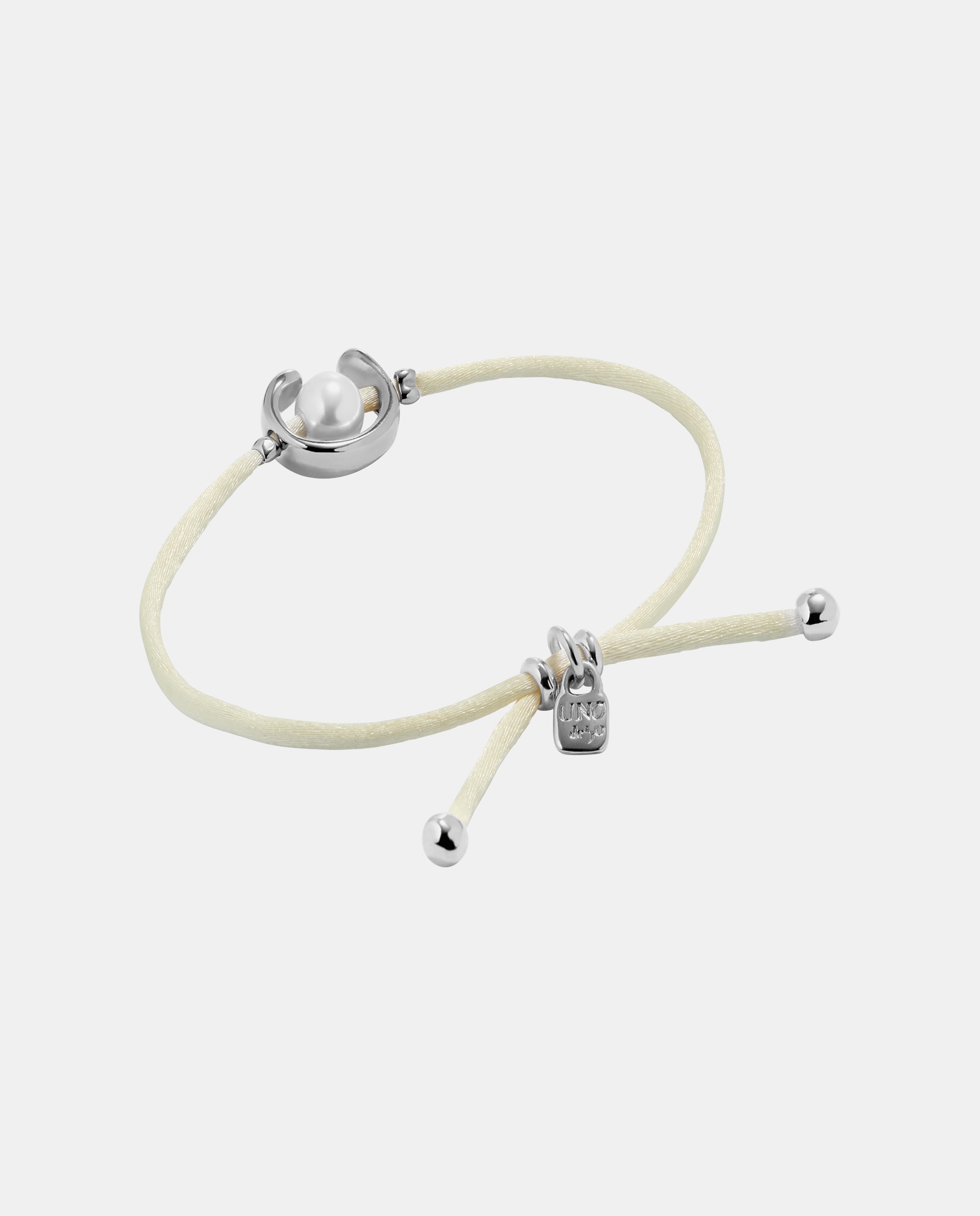 Imagen 2 de Pulsera de hilo crema con perla shell fornitura bañada en plata de ley - UNO de 50 - Plata Plata