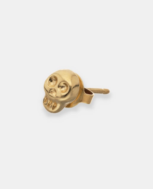 Imagen 0 de Piercing bañado en oro 18k en forma de calavera