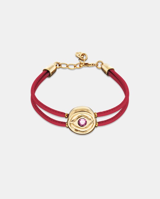 Imagen 0 de Pulsera de cuero rosa oscuro con detalle de ojo bañado en oro 18k y cristal