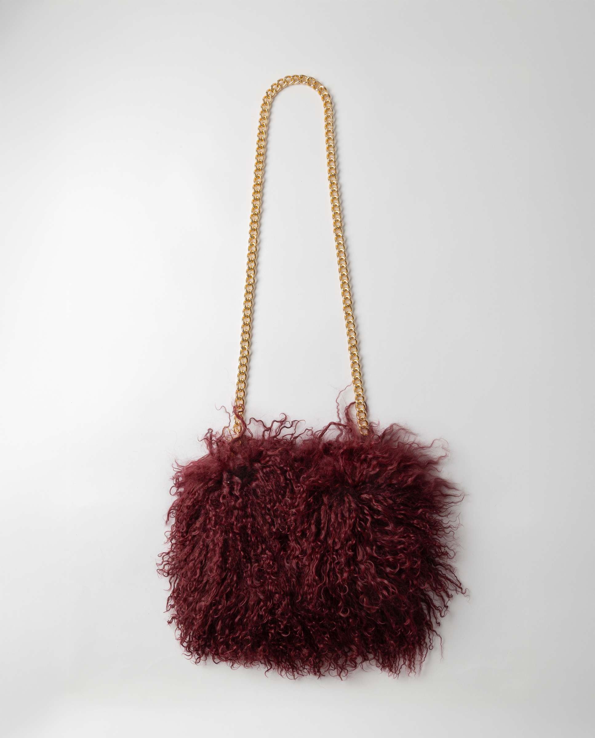 Imagen 0 de Bolso de multiposición de pelo de kid en color burdeos Burdeos