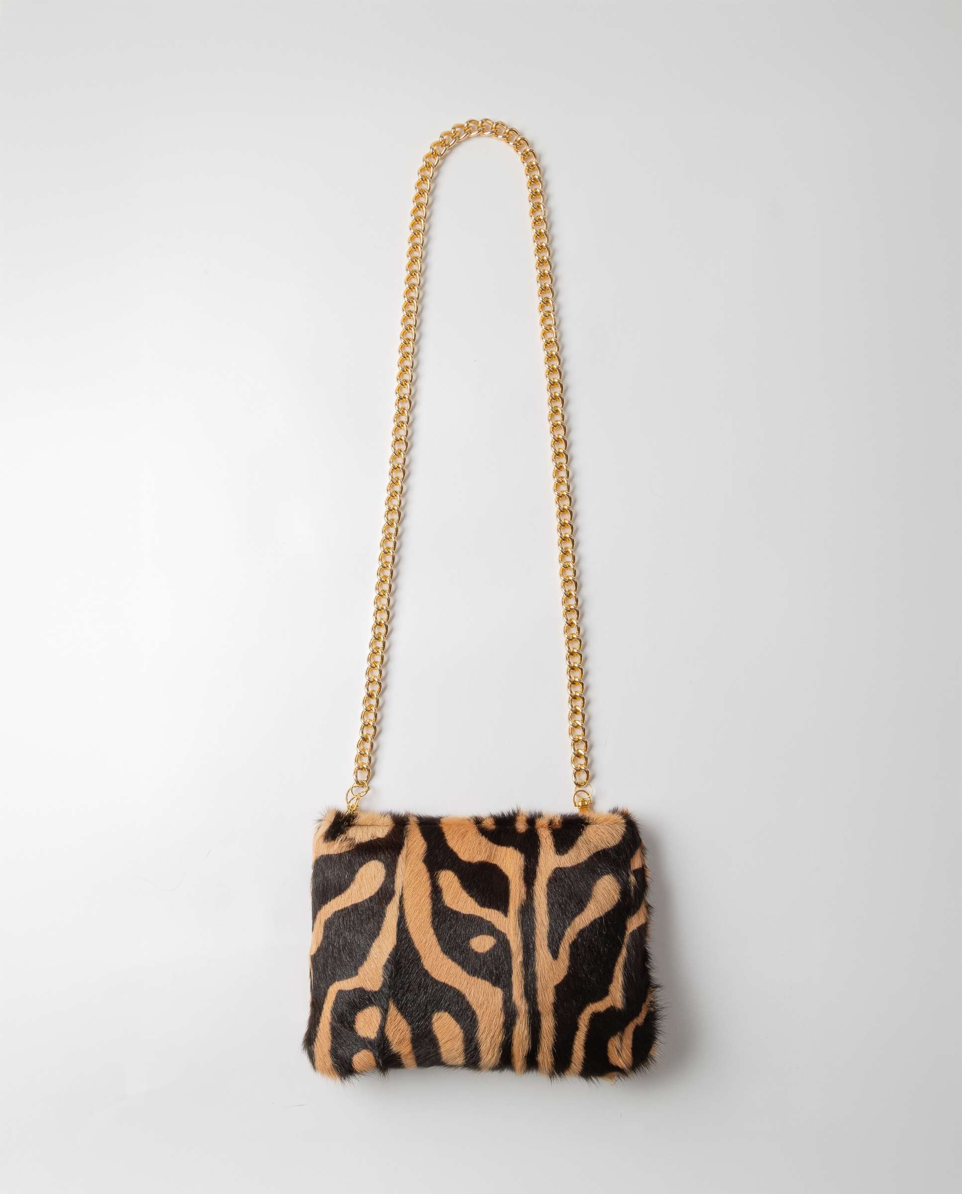 Imagen 0 de Bolso multiposición de pelo de kid estampado Burdeos