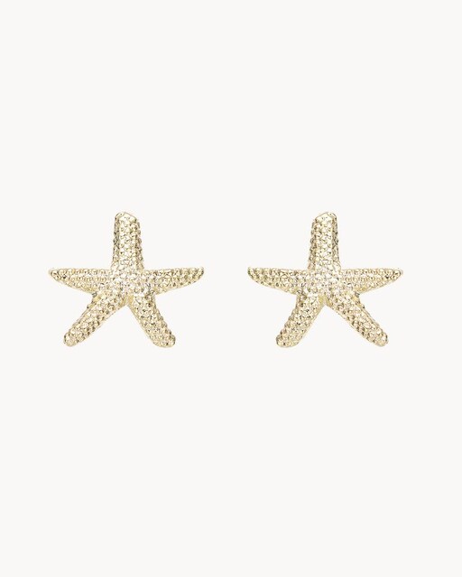 Imagen 0 de Pendientes con forma de estrella y detalle en pedrería