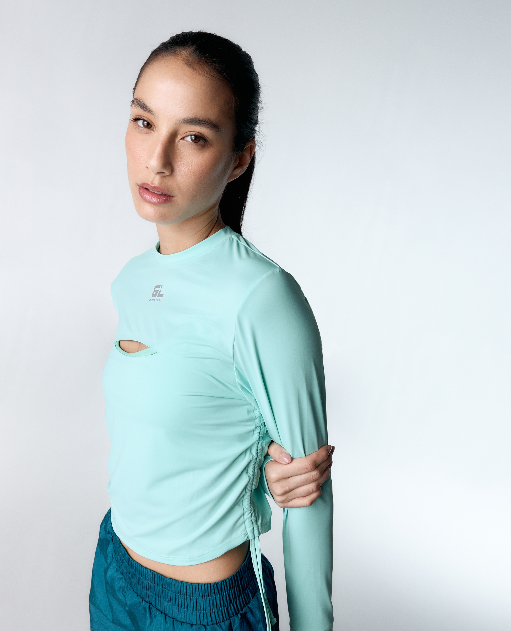 Camiseta deportiva de mujer con tejido efecto cooling y protección solar - Black Limba - Verde Verde-1