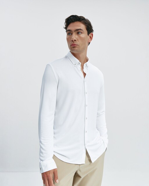 Imagen 0 de Camisa non iron de hombre corte regular lisa en blanco