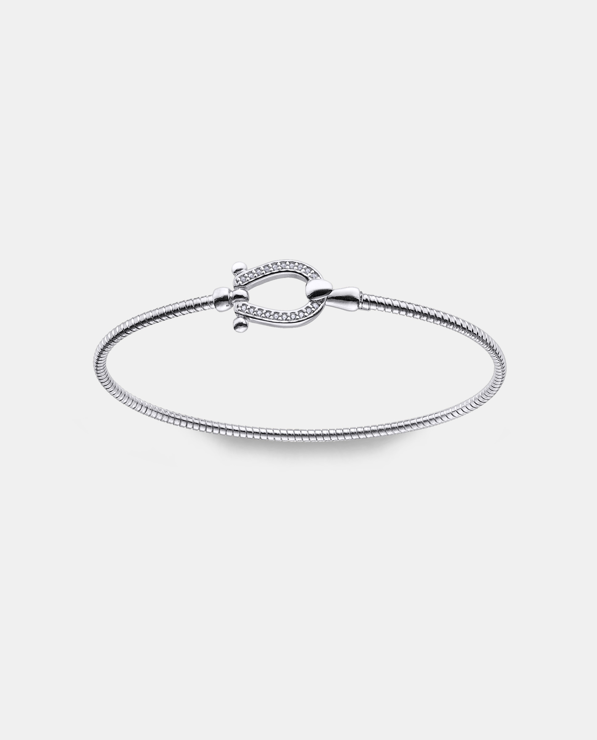 Imagen 0 de Brazalete tubogas de plata y detalle estribo con pavé Plateado