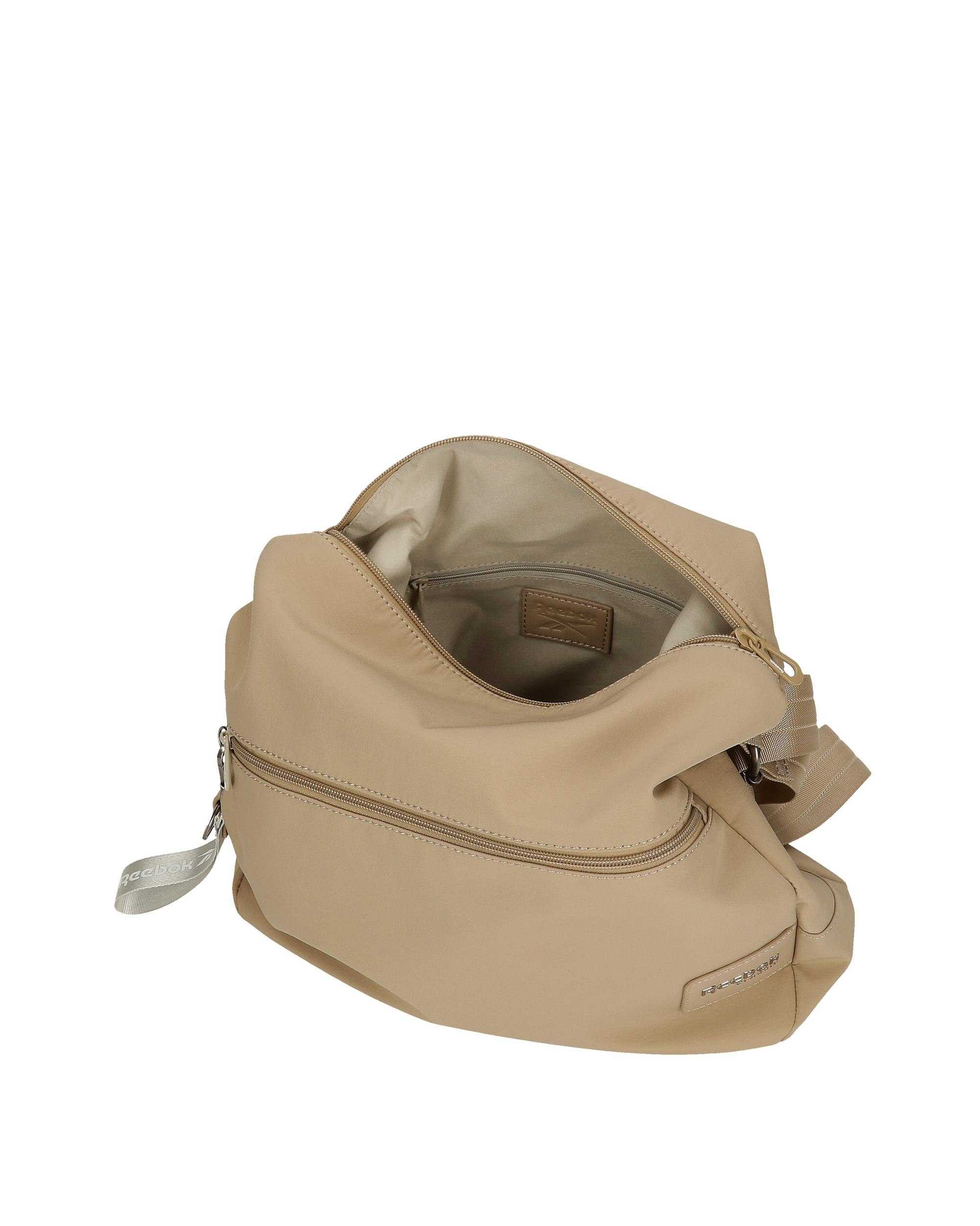 Bolso mochila Cherry con bolsillo frontal Reebok El Corte Ingles